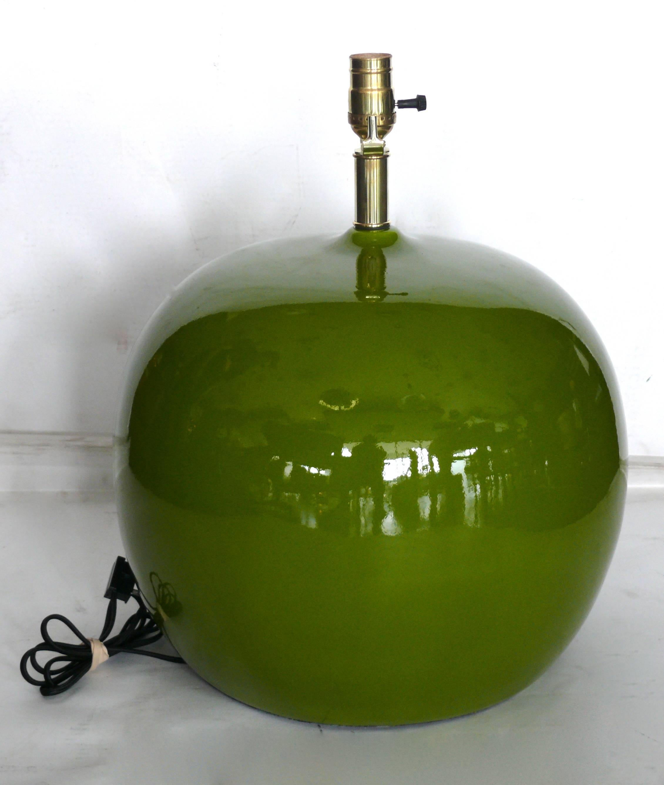 Large-scale 1960s ceramic table lamp in apple green. Excellent vintage condition and newly rewired. Great scale and matching saffron lamp available.