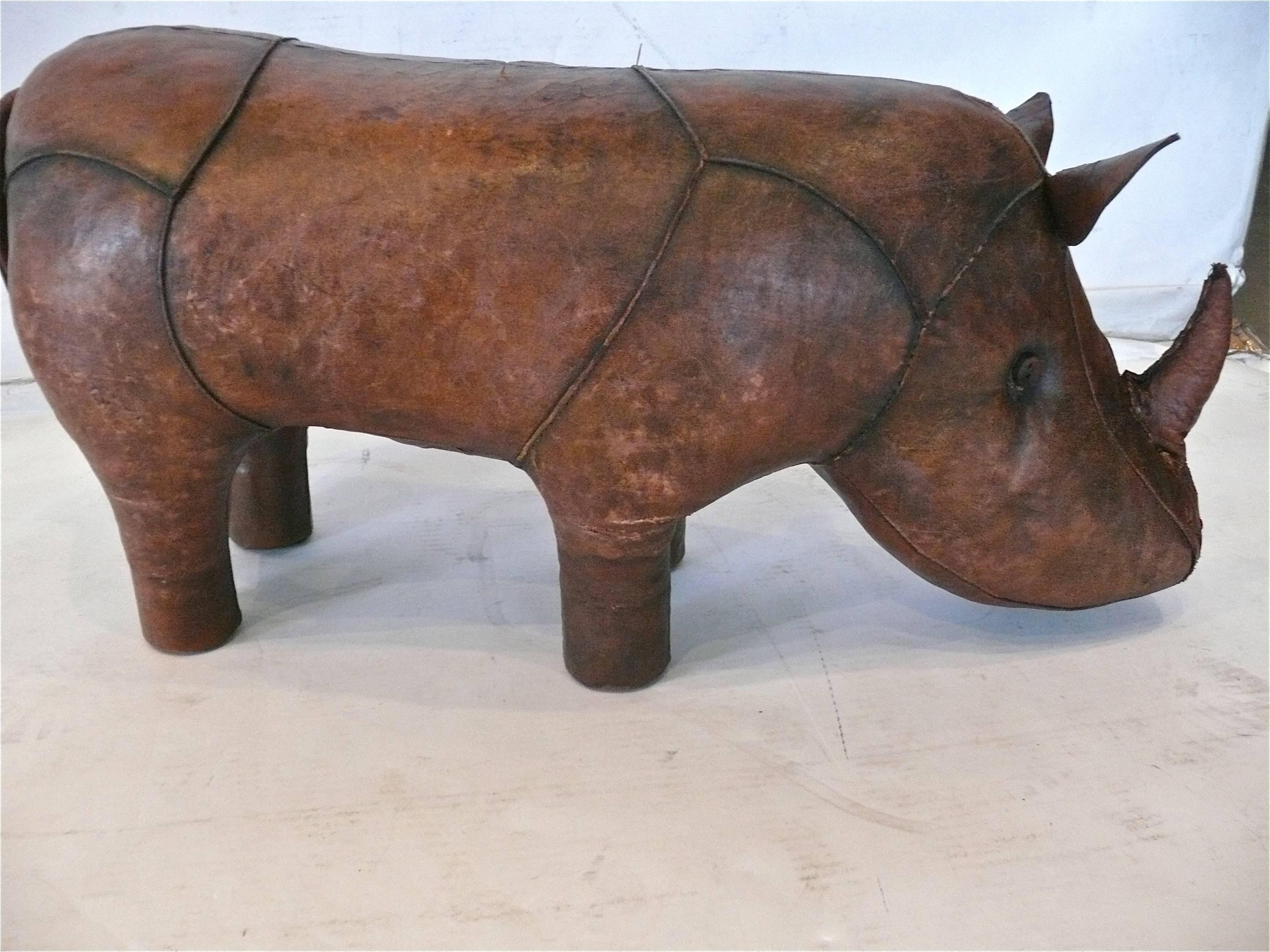 Handsome Rhinoceros designed by Dimitri Omersa for Abercrombie & Fitch as a store display in the 1960s. Great patina to leather.