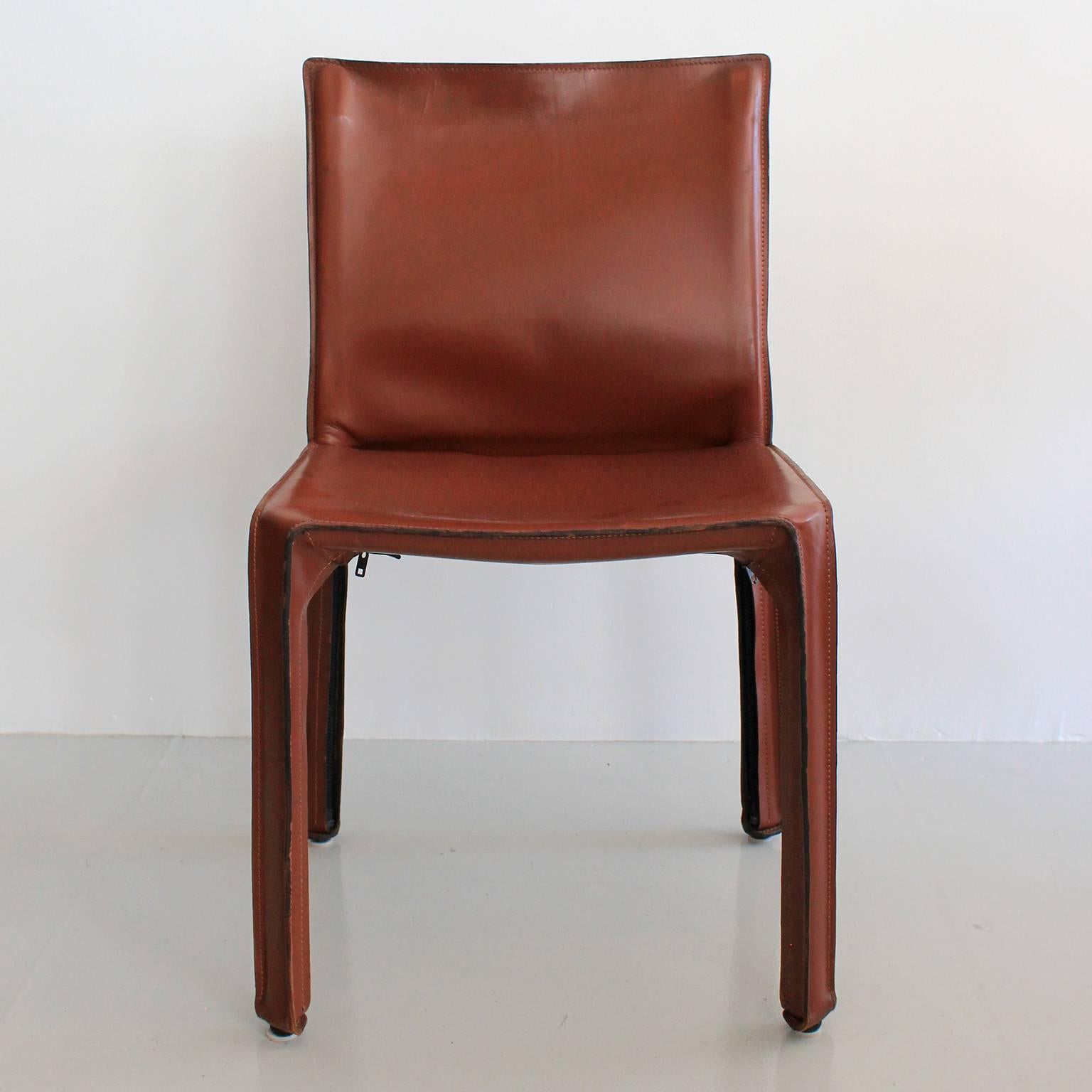 Classic saddle leather CAB chairs by Mario Bellini for Cassina. Great patina to leather. Excellent vintage condition. Set of eight (8) available.