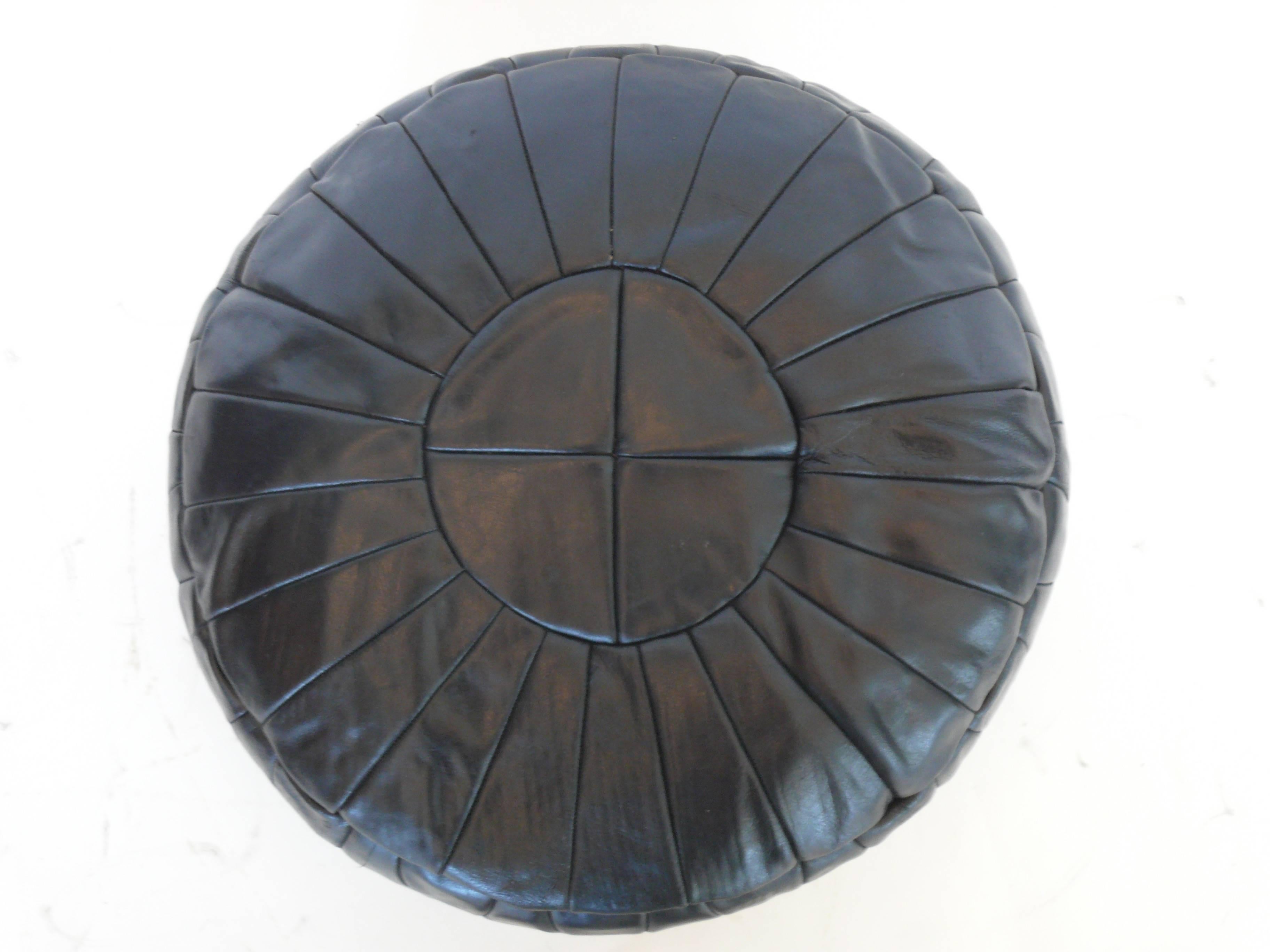 De Sede leather ottoman with signature patchwork leather.  
Great original patina.
