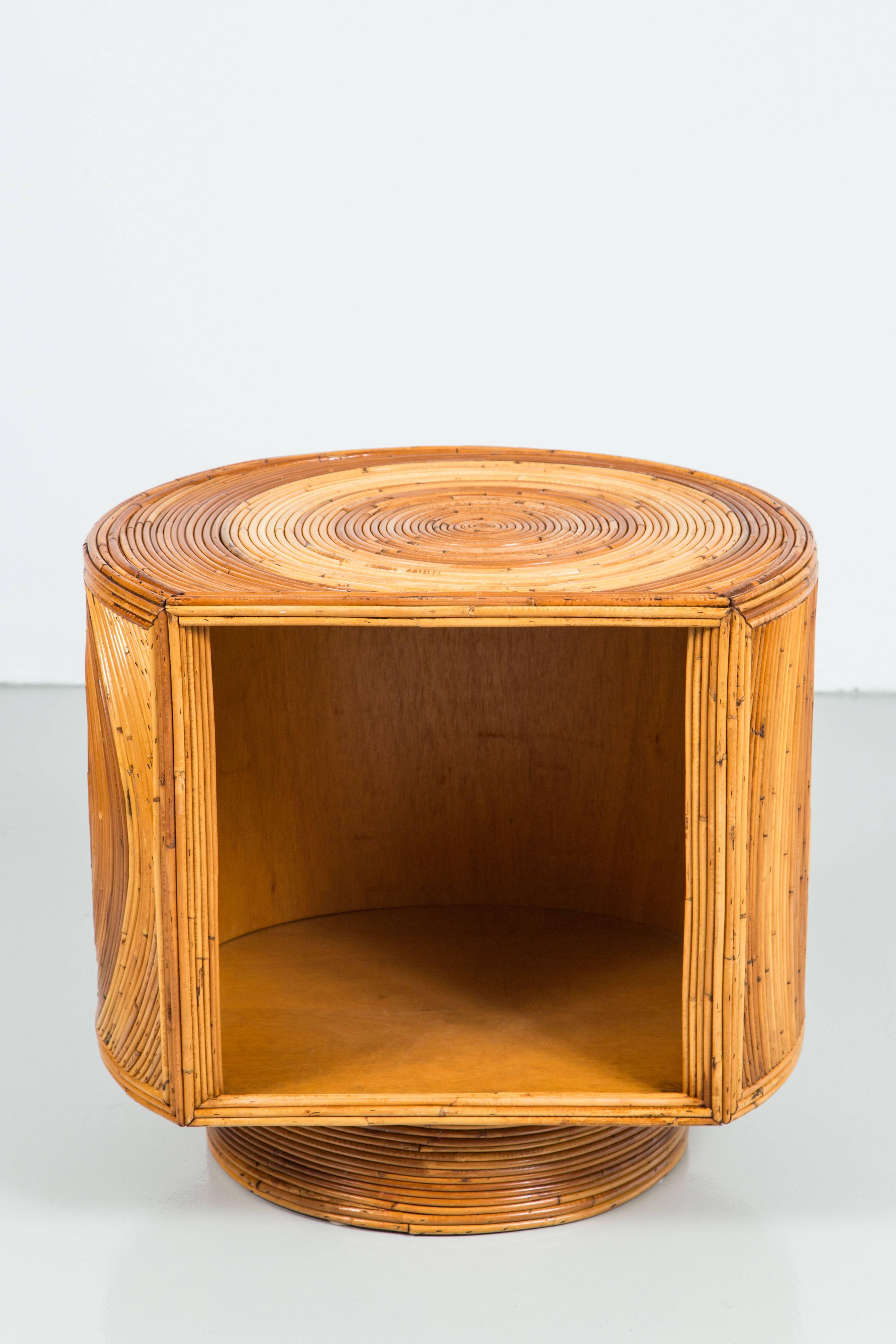Fantastic pair of Gabriella Crespi style end tables with circular patterned bamboo top and sides. Very well made and functional design with swivel bases and open storage.