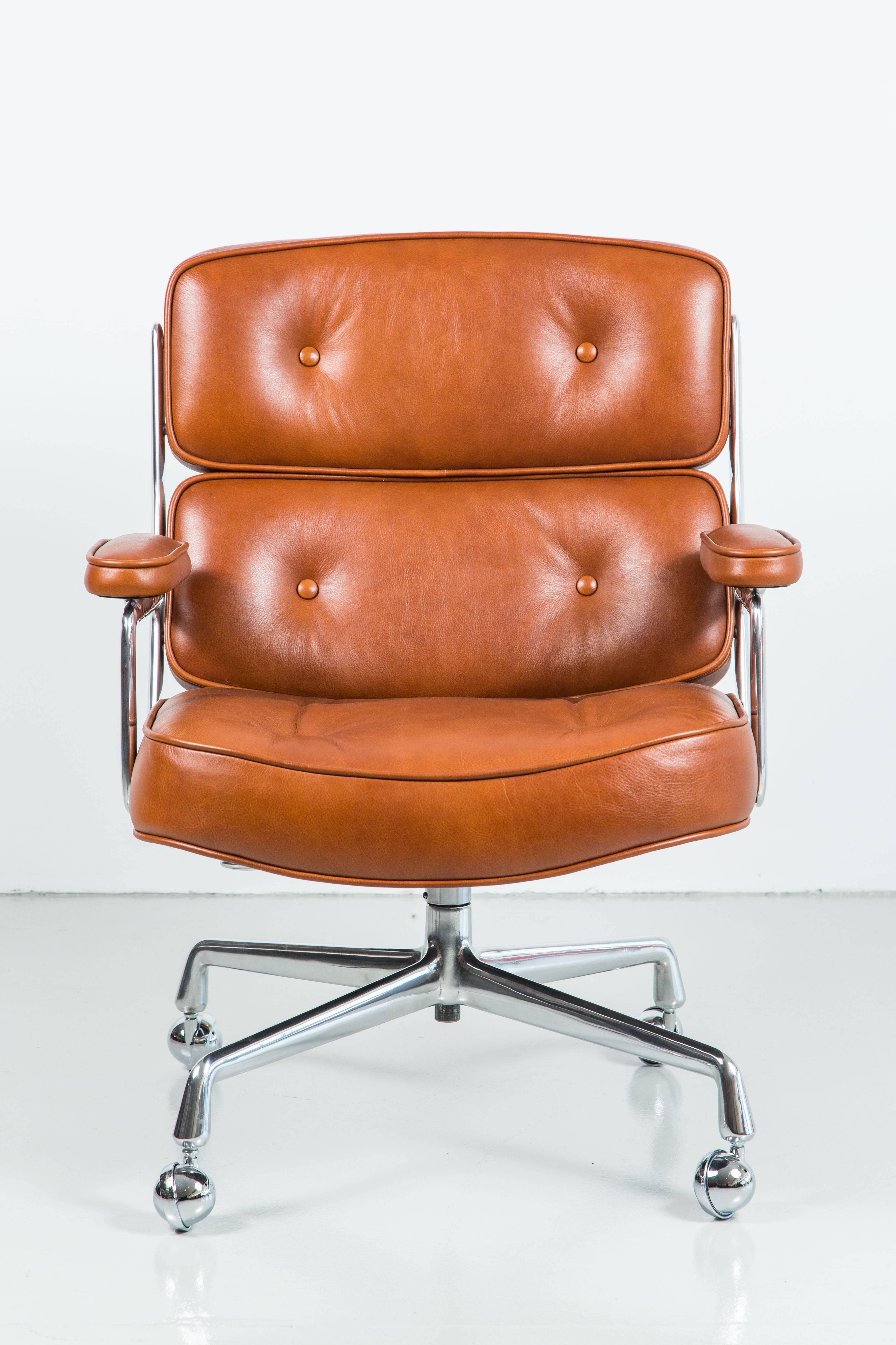 Classic office chair from the Time Life building in New York. New caramel leather upholstery along with newly polished aluminum base. Chair has an adjustable height with tilt and swivel. Multiple chairs available. Can be COL or COM.