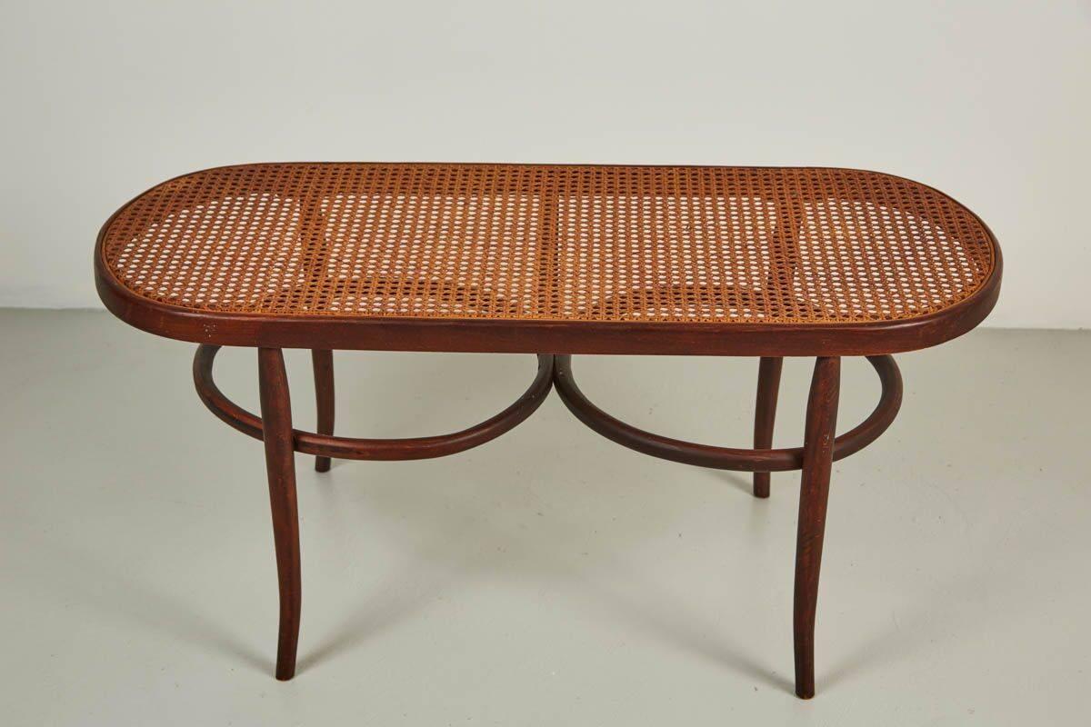Fantastic vintage Thonet bentwood and cane bench with beautiful patina to wood and graceful lines.