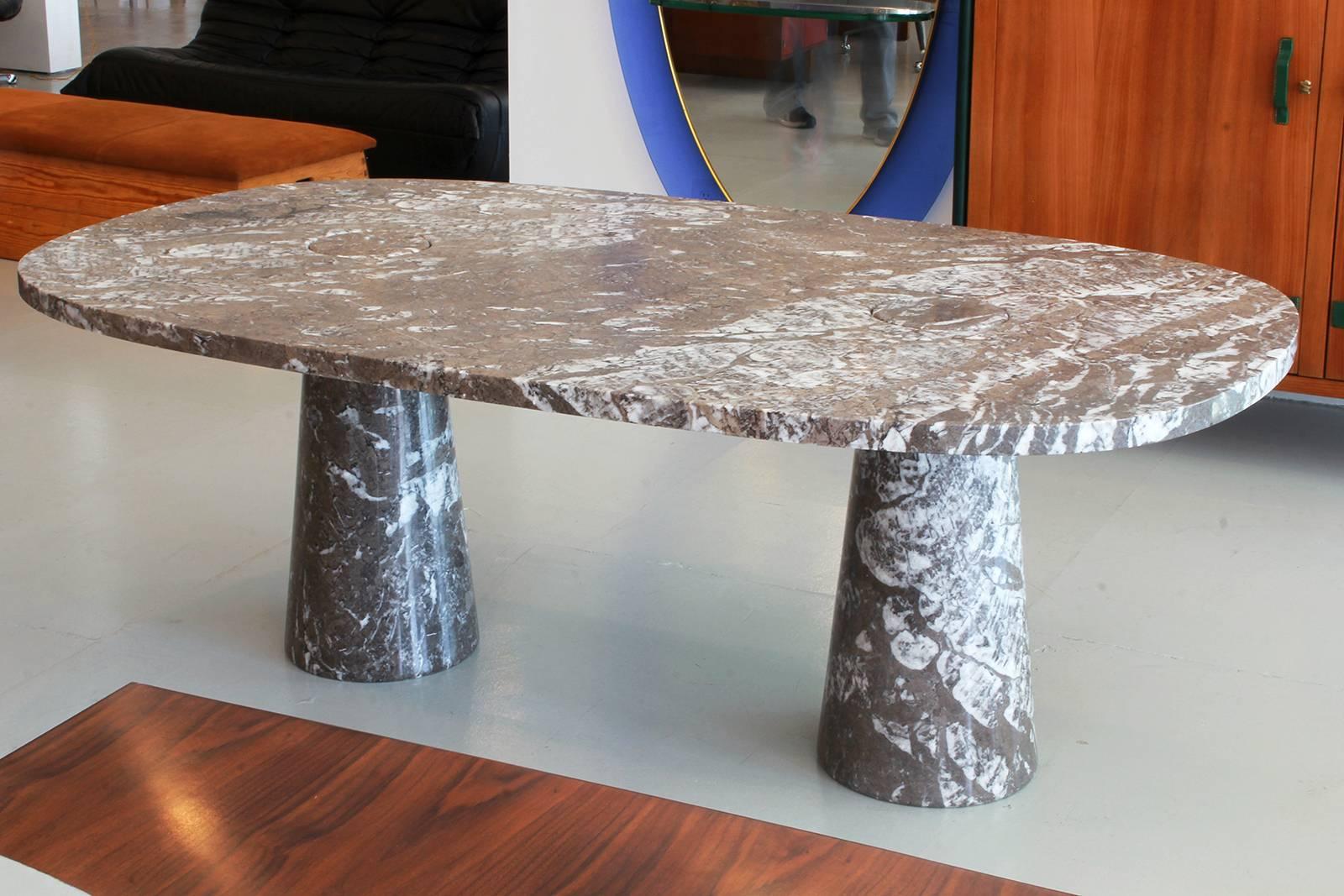 Absolutely magnificent large marble dining table from Mangiarotti’s Eros series. Beautiful marble top floating over marble conic pedestals with light white veining throughout.
Massive and rare piece!
Additional photos to come!