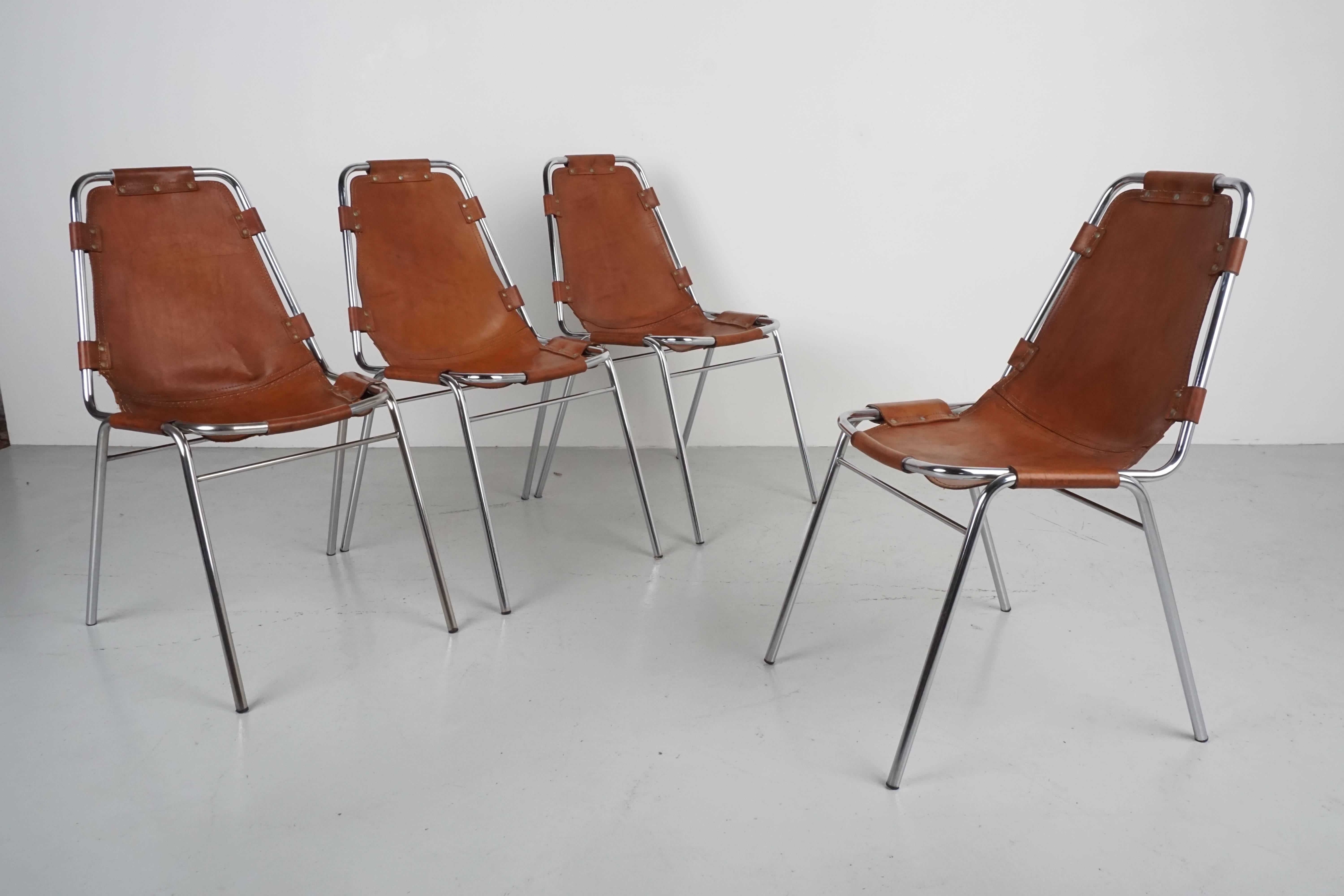 Dining room chair for Les Arcs ski lodge. Original patina all eight slightly different in age and wear.