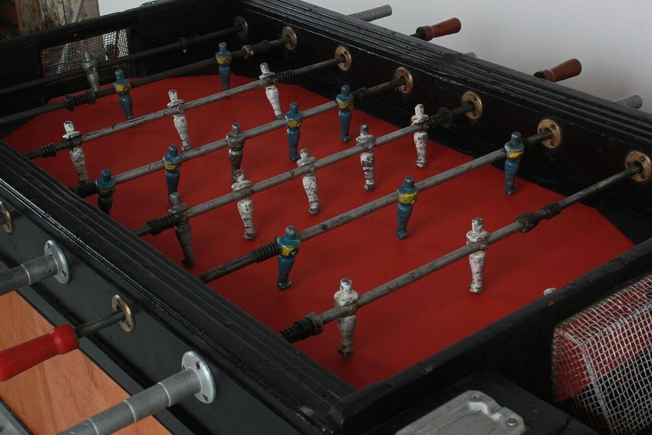 Fantastic Italian foosball table with original players.
Professionally restored, new vinyl playing field, metal goals, wood score pegs and three balls.
 