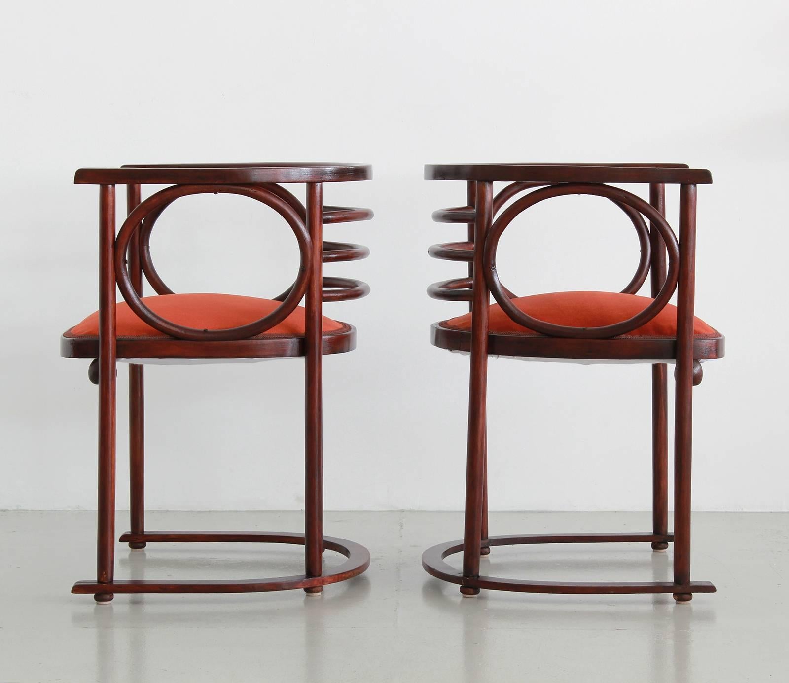 Gorgeous pair of Fledermaus chairs by Austrian architect Josef Hoffman, one of the founding fathers of the Vienna Succession and the International Style, influencing such masters as Alvar Aalto, Le Corbusier and Carlo Scarpa. 
Celebrated for his