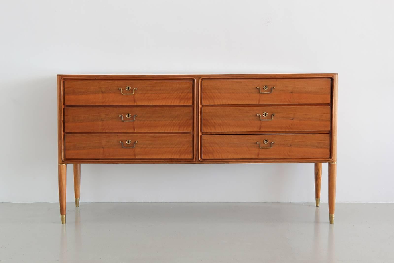 Six-drawer dresser in satin walnut each with original hardware and lockable capabilities. Incredibly restored to original excellent condition.