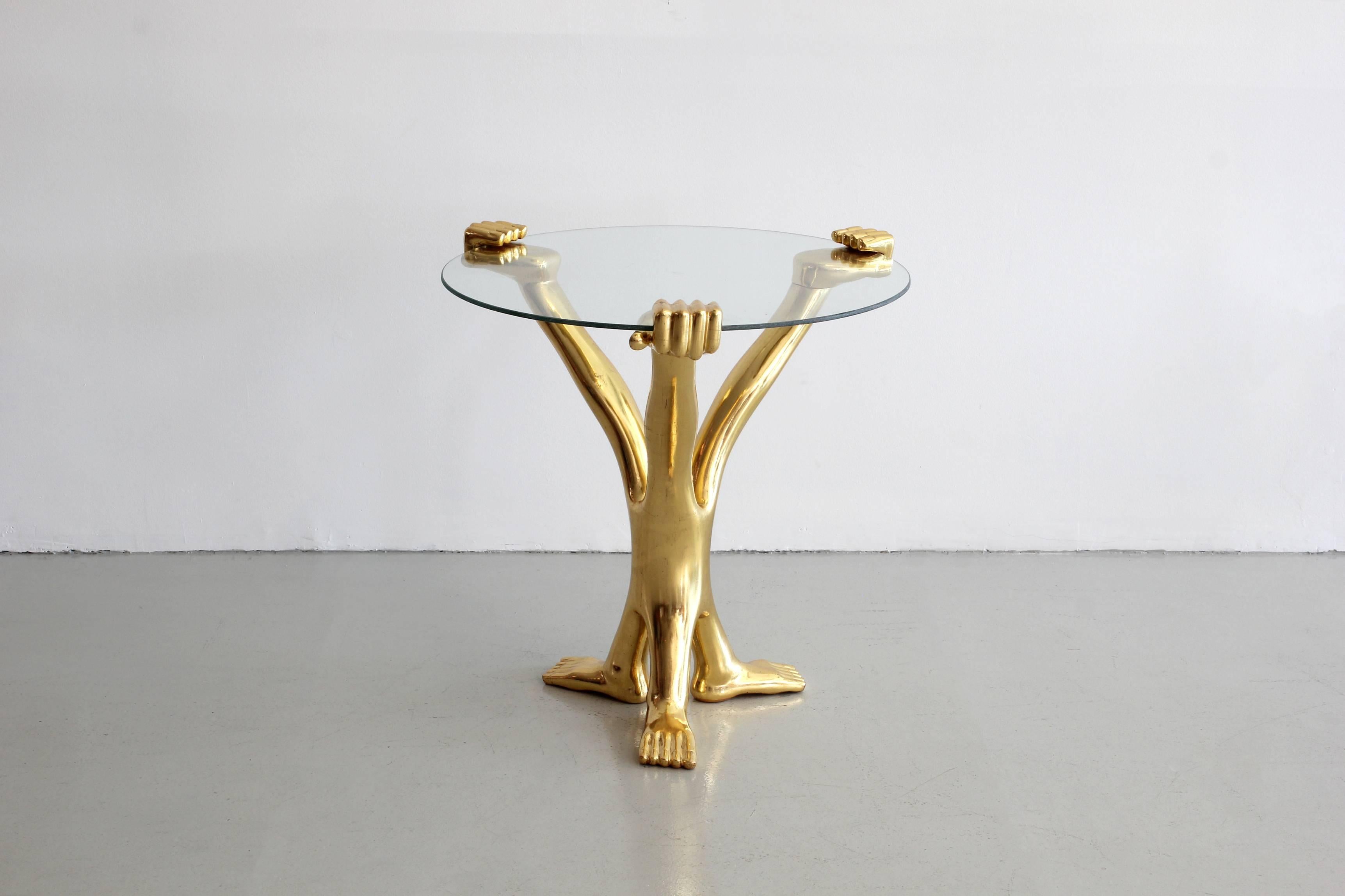 Gilt hand and foot table by Mexican designer Pedro Friedeberg.
Signed on underside of foot.