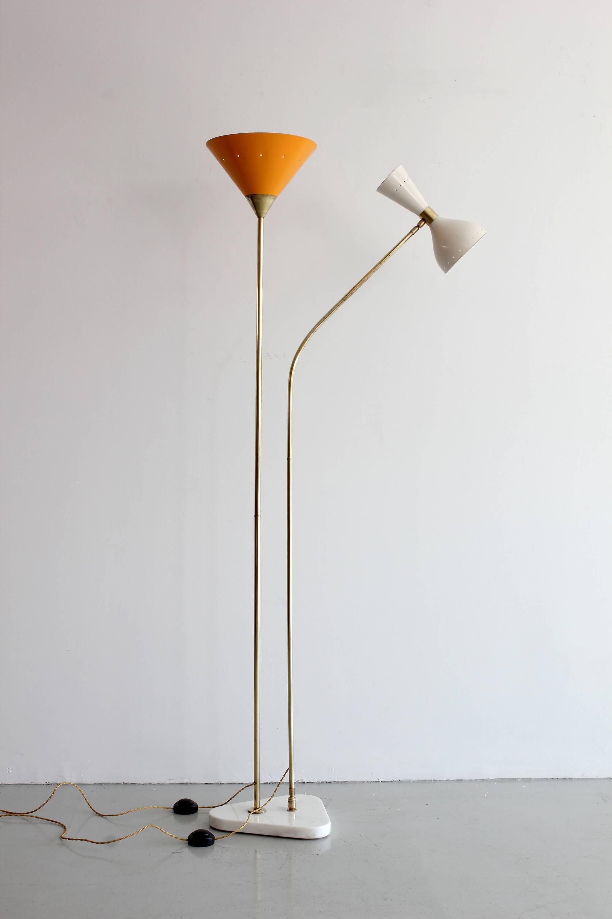 Floor lamp in the style of Stilnovo with two cone shades offering up and down light.
Newly produced in Italy and newly rewired by Orange.