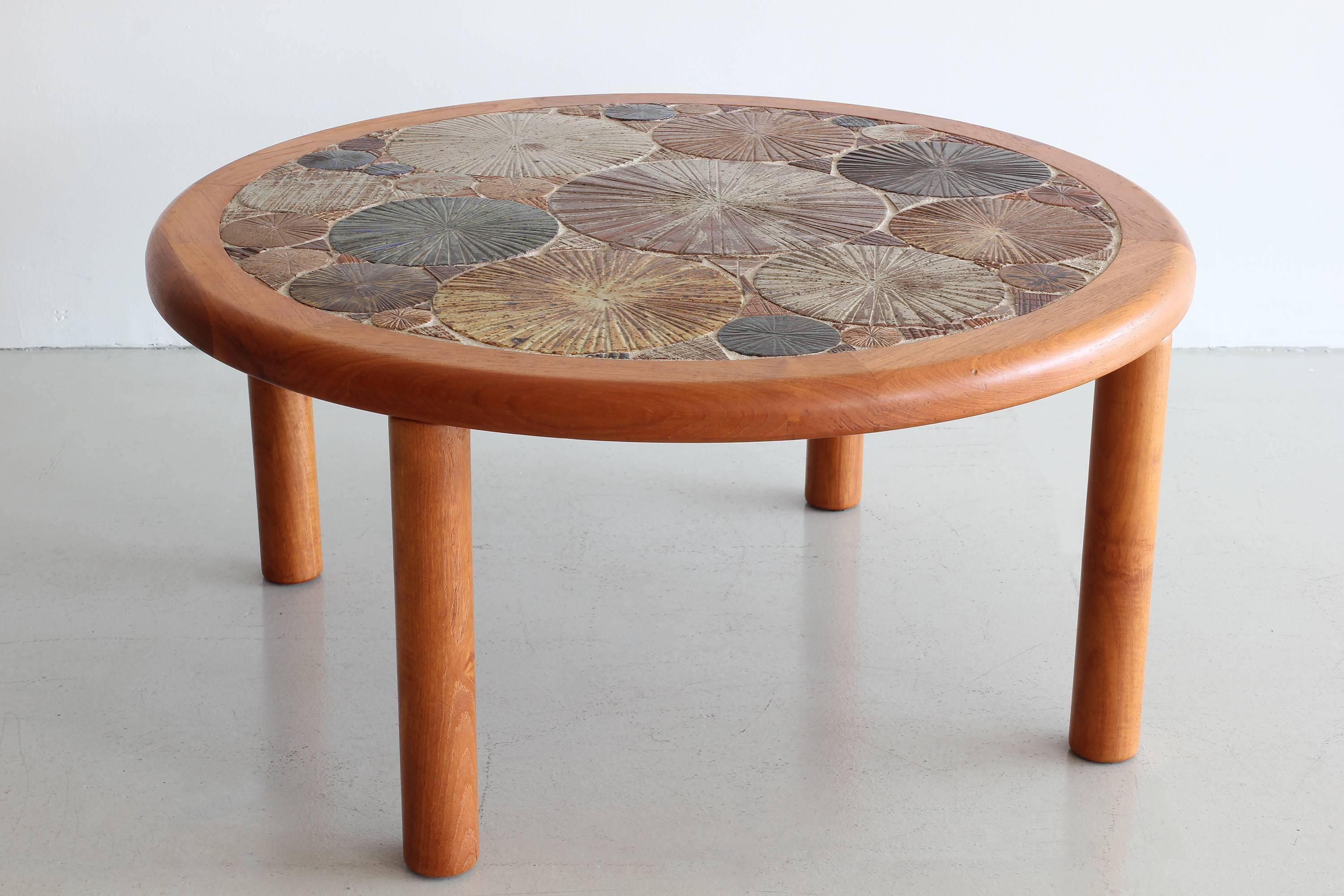 Gorgeous ceramic tile coffee table by Tue Poulsen for Haslev Danish Modern. 

Wonderful color and texture to the tile work and table is hand signed. 

Rare to find in USA. 

Oak legs and edge have been professionally restored to original