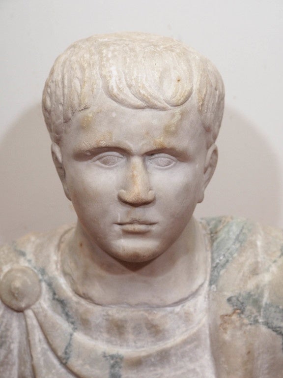 Period Roman bust of young man.