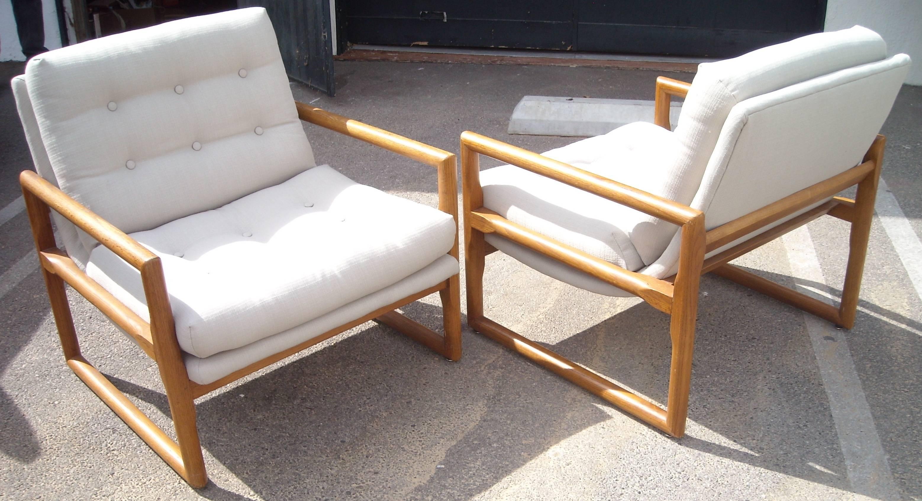 Nice and comfy lounge chairs in oak and new off-white synthetic linen.