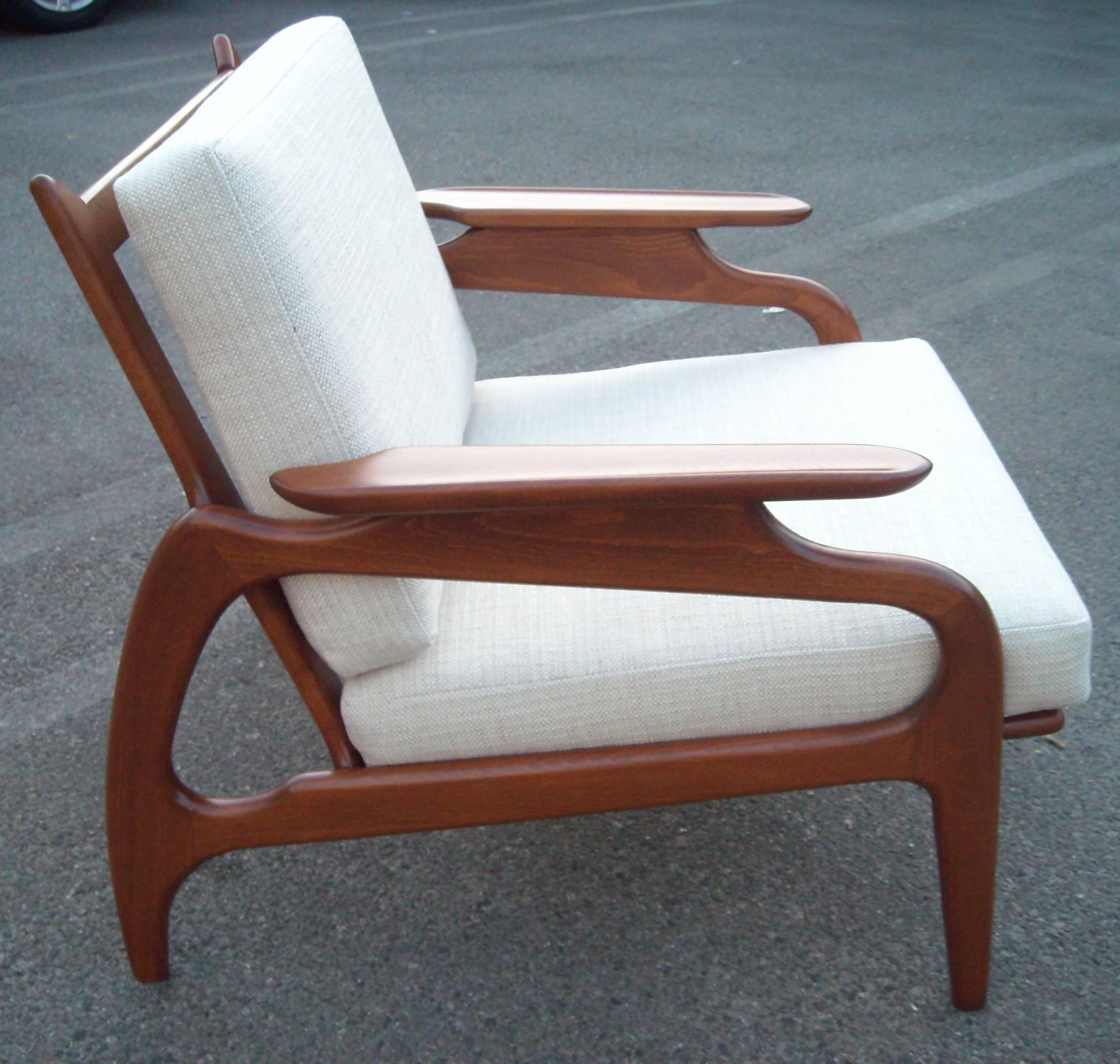 Nice and organic design in this lounge chair, refinished and new fabric cushions.