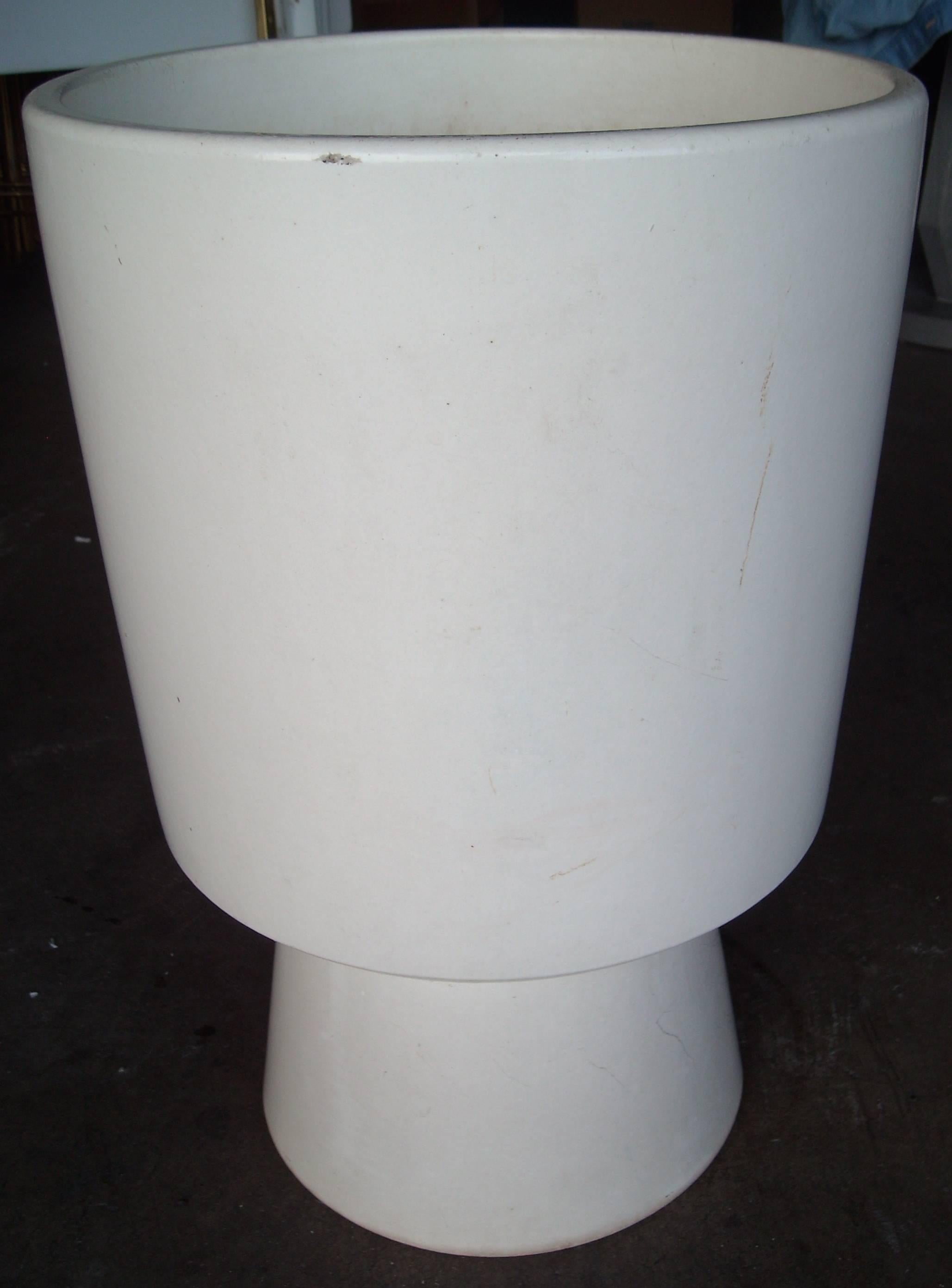 Nice tall, planter in matte white glaze. Good condition, small rough are at rim. As shown.