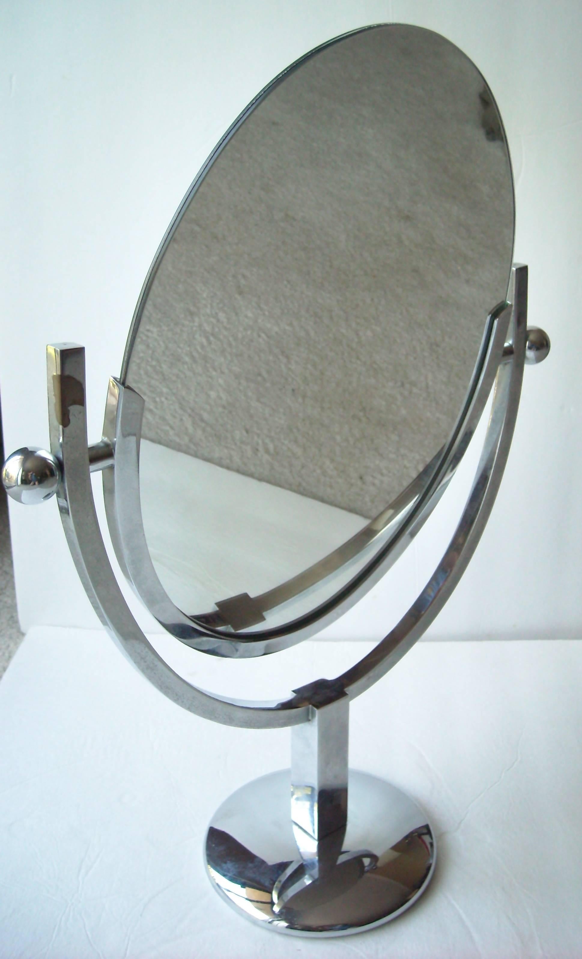 Nice vintage chrome vanity mirror by Charles Hollis Jones. Light lost chrome in back.