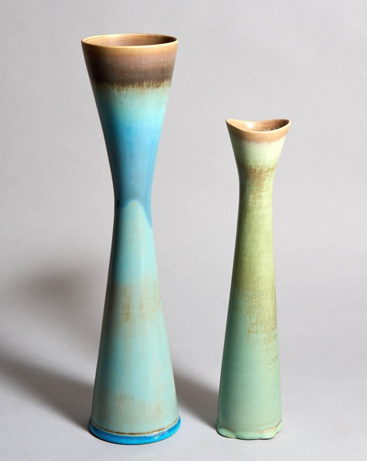 Prof. Stig Lindberg (1916-1982) was a man of very many talents, and his restless creativity yielded an amazing variety of objects. Their wide range of form, surface detail, and glaze color makes any grouping of these unique stoneware studio vases a