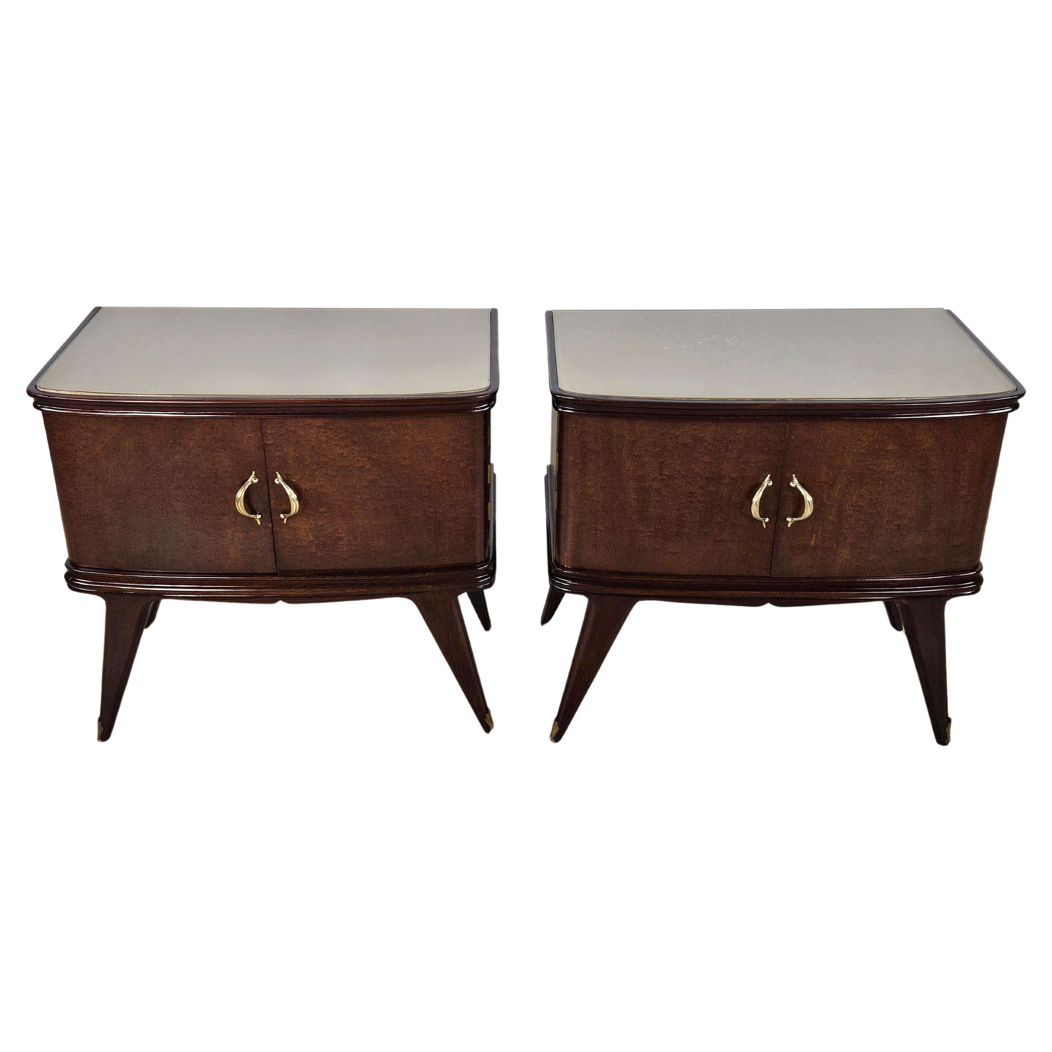 1950s mahogany feather bedside tables with brown glass and brass handles For Sale