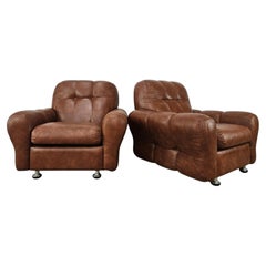 Vintage brown Italian-designed leather armchairs, 1970