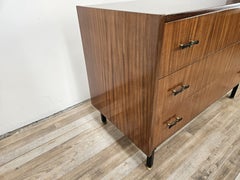 1960s teak chest of drawers with three drawers and height-adjustable legs