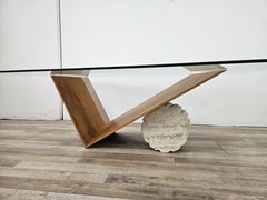 "Valentino" coffee table by Cattelan Italia, made of glass, wood, and travertine, 1990