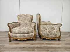 Poltrone Bergère in stile Barocchetto italiano in legno intagliato e dorato