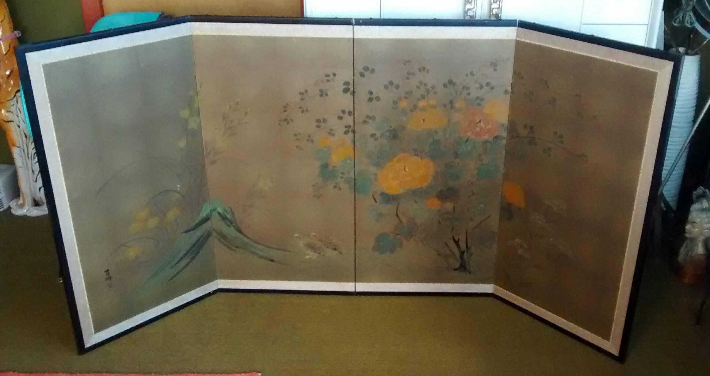 Lovely 1930s period Japanese table top size folding screen. 

Rendered on gold leafed paper, hand painted, including chrysanthemums, a stylized Mt. Fuji, and a pair of birds. 

Signed in the lower left corner. Edged in silk, and framed in