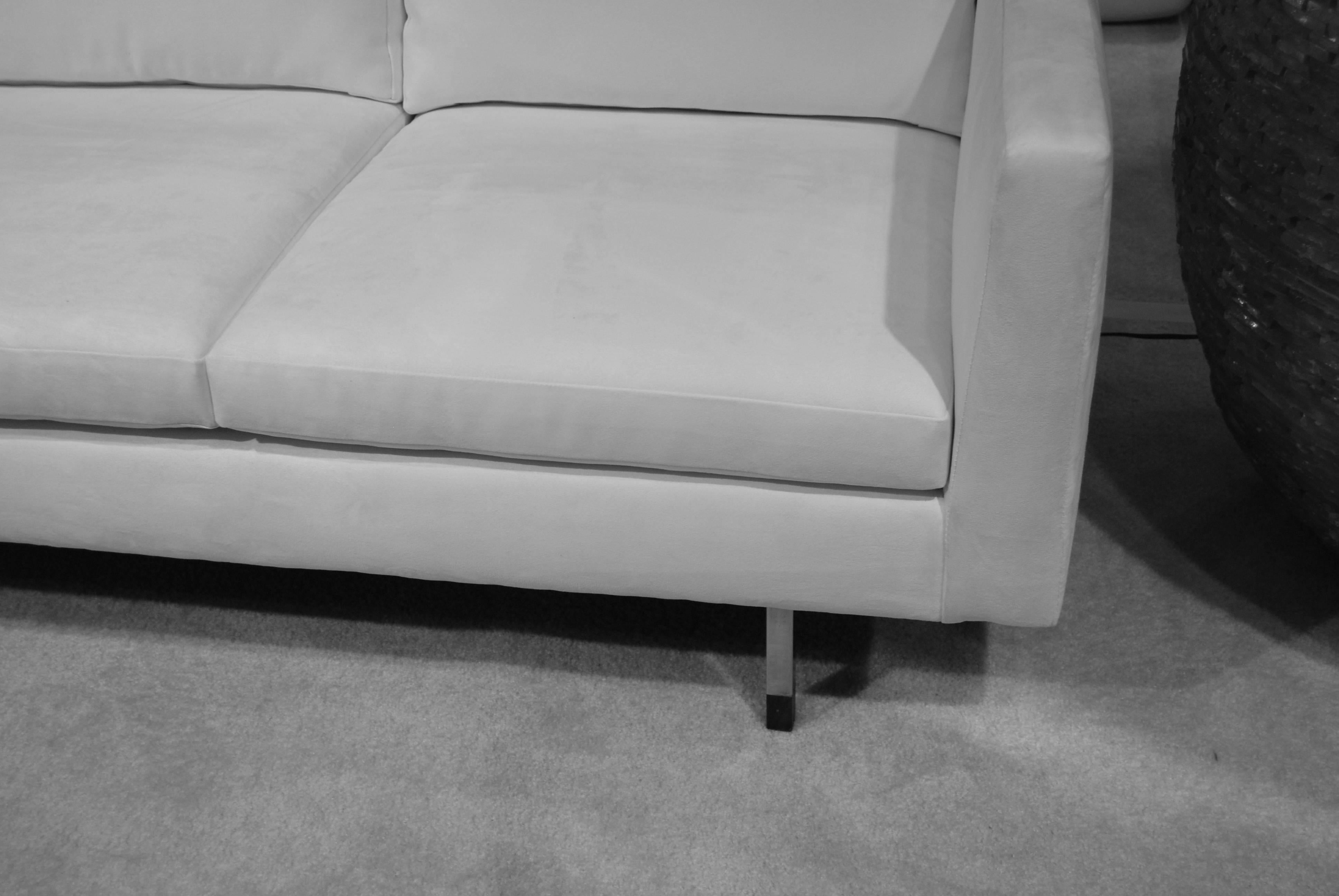 These Knoll attributed sofas are covered in high quality white ultra suede.