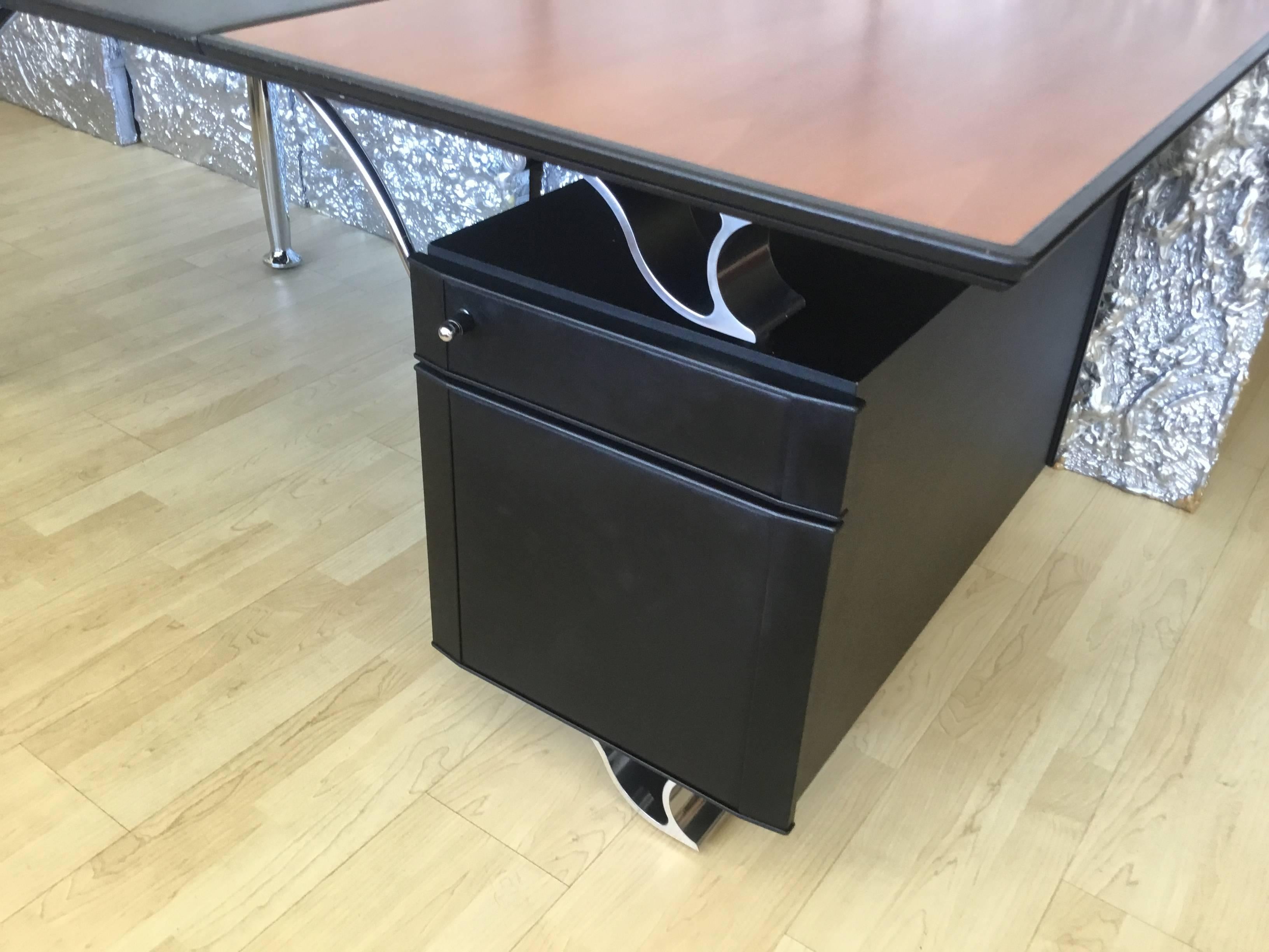 The Poltrona Frau desk is in very good condition.