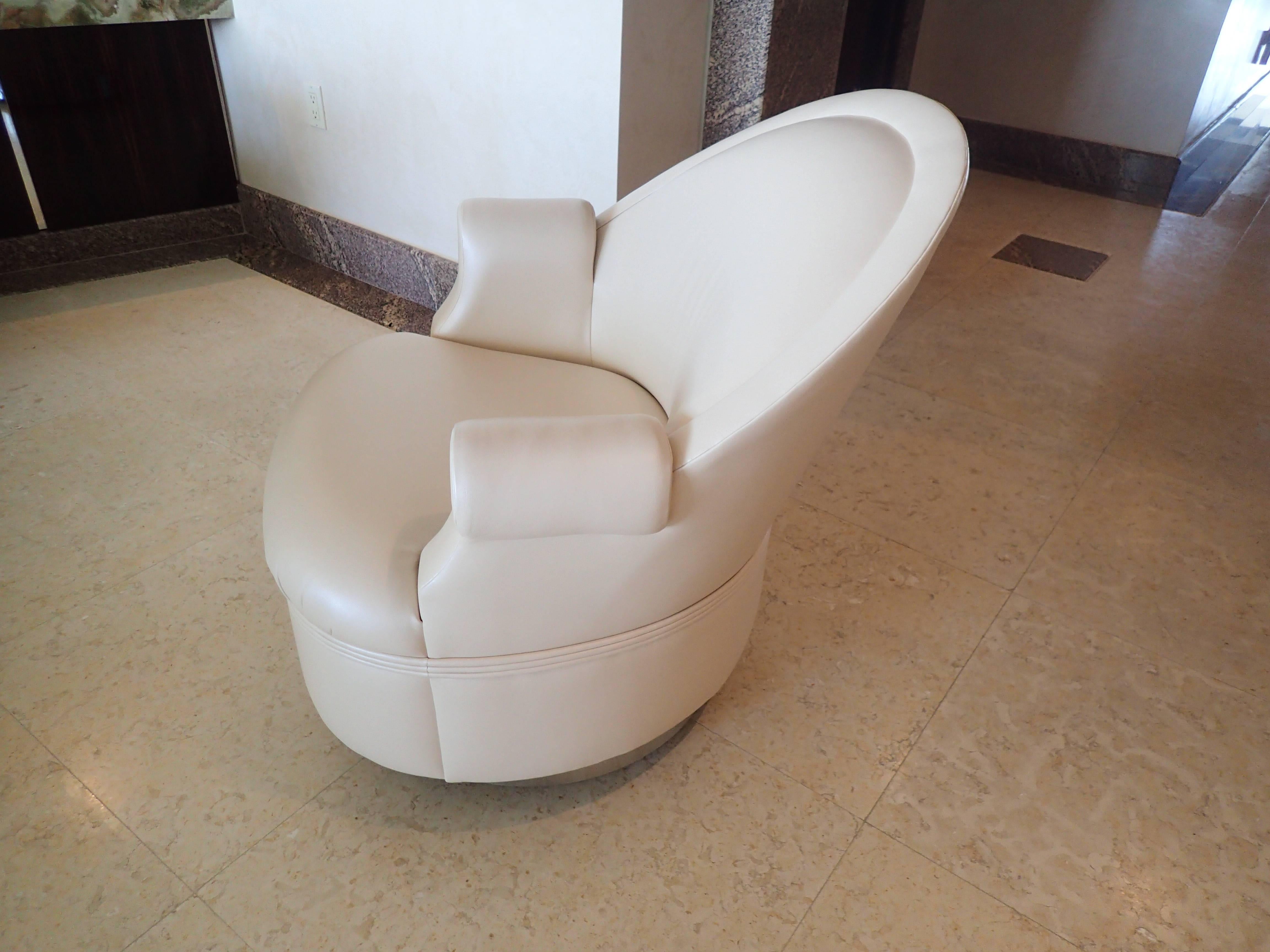These chairs swivel and are on castors. The leather is in excellent condition and the stainless base is as well.