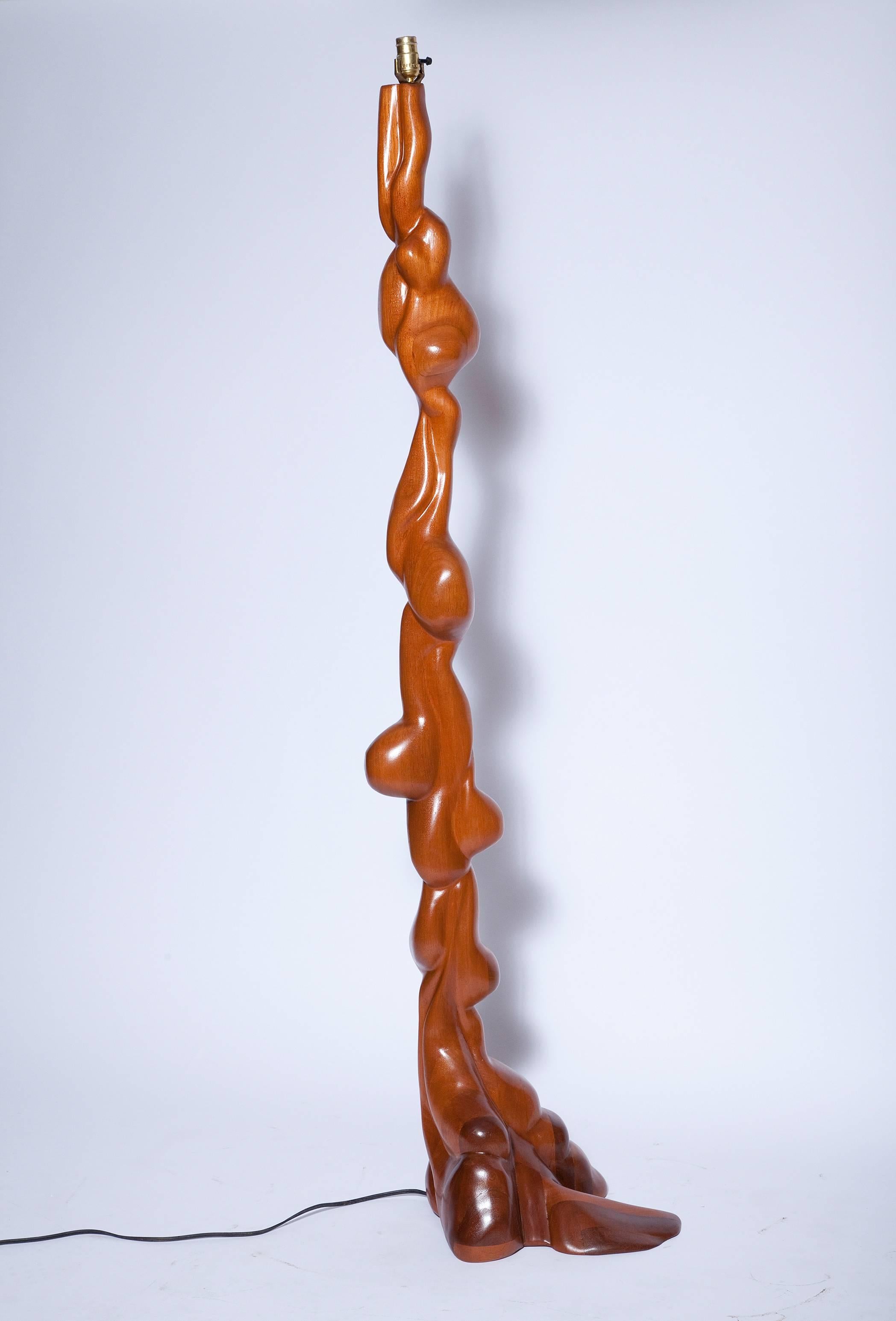 Sharing much of the sculptural fluidity of pieces by Wendell Castle, this spectacular American Craftsman studio floor lamp is painstakingly carved from multiple individually-carved parts, joined as a whole. Excellent restored condition with original