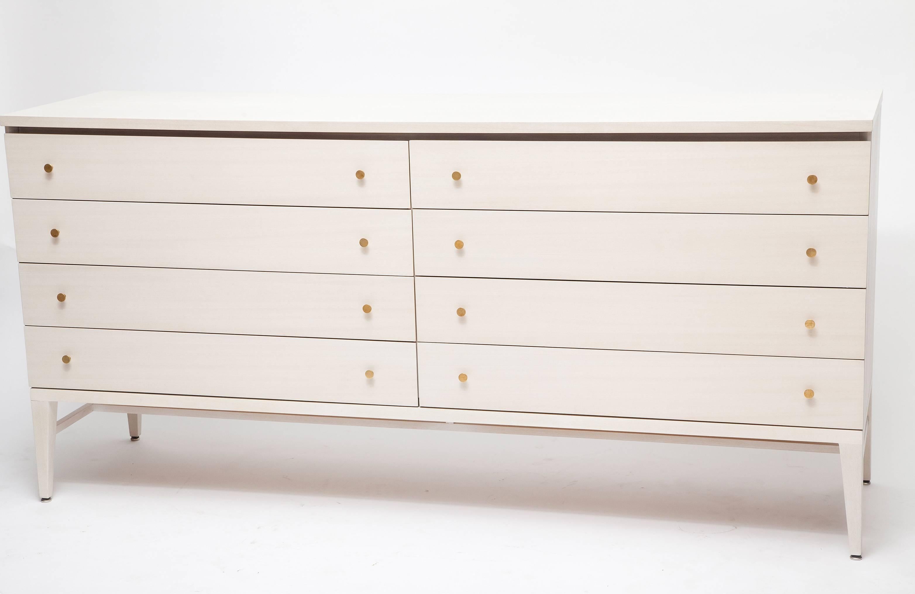 Very special bleached mahogany dresser by Paul McCobb. We've bleached it an additional three times to bring out the dreamiest shades of cream and grey in the grain. A stunner! Original brass hardware, hand-polished.