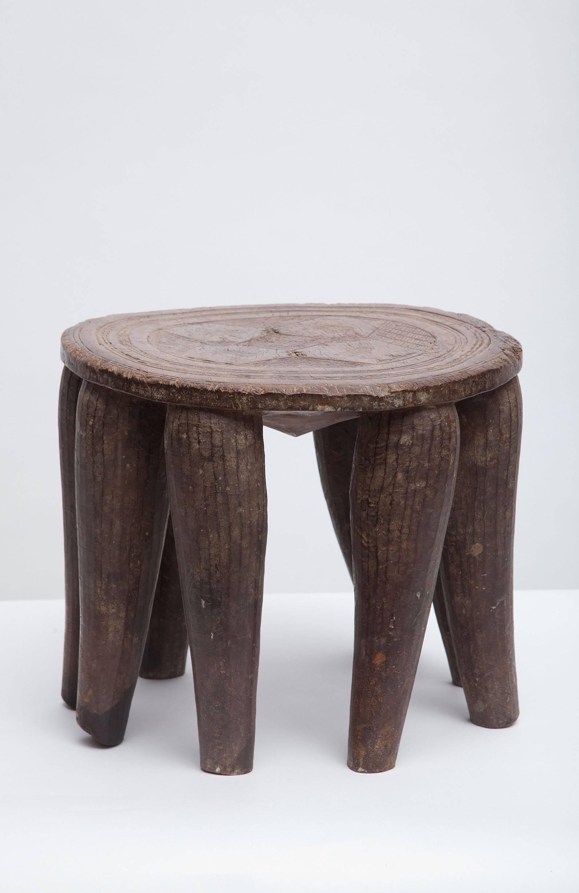 Hand-carved Nupe tribal stool. Nigeria, circa 1950. Excellent age and patina.
