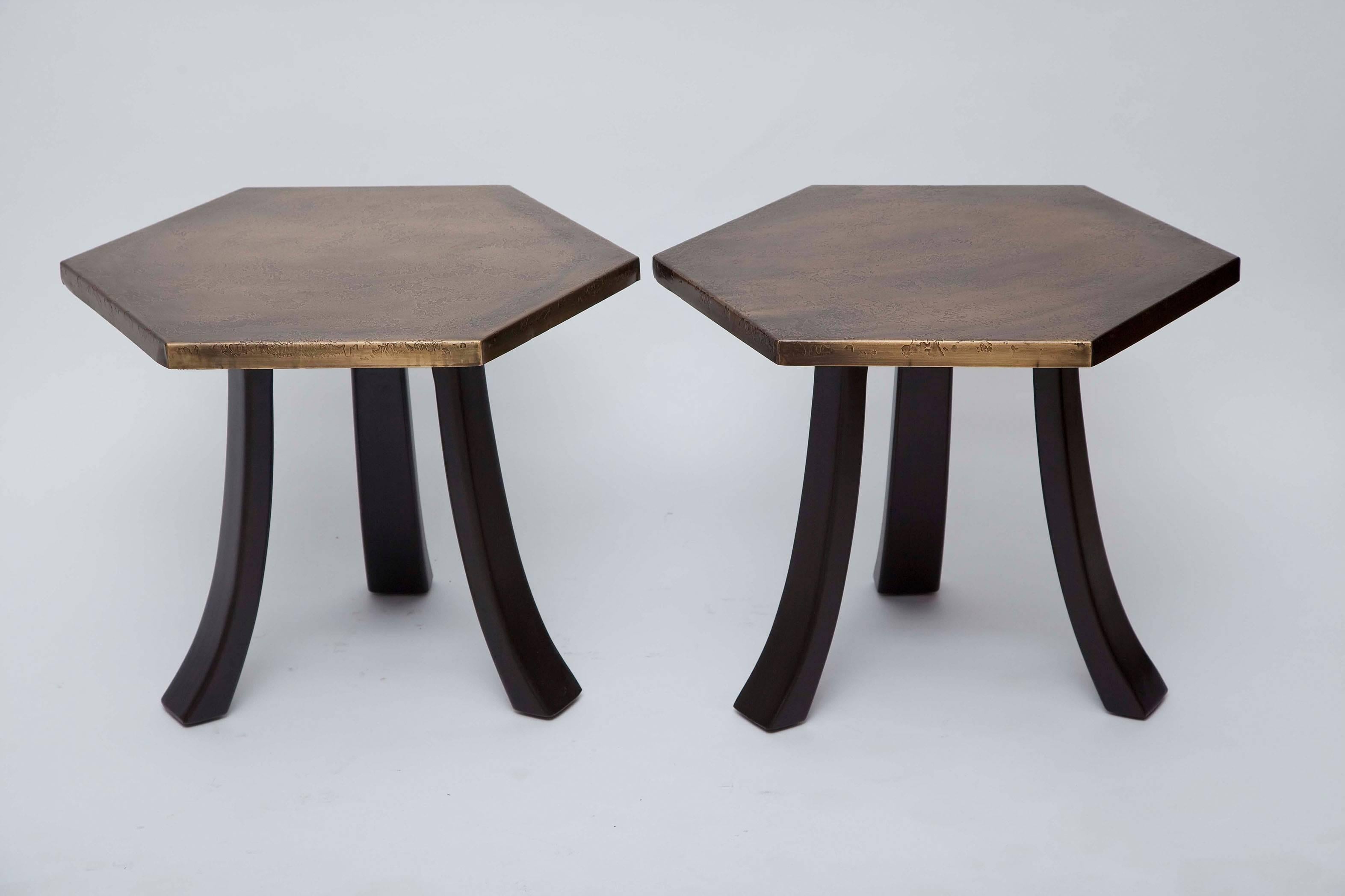 Pair of Harvey Probber side tables with walnut legs and hexagonal tops covered in patinated etched brass. Make a unique coffee table when clustered with our hexagonal Probber terrazzo or John Keal pebbled resin tables side tables!