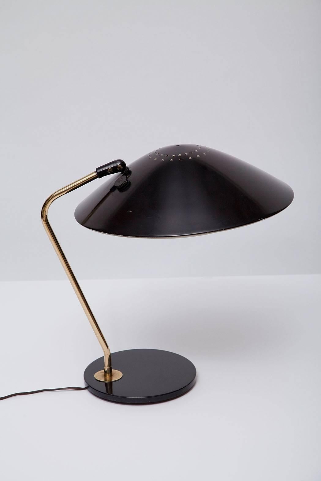 The best of these we've seen! Black enamel and brass desk lamp by Gerald Thurston for Lightolier. All original, with intact plastic diffuser and "Lightolier" branded switch. A handsome classic, not to be missed.