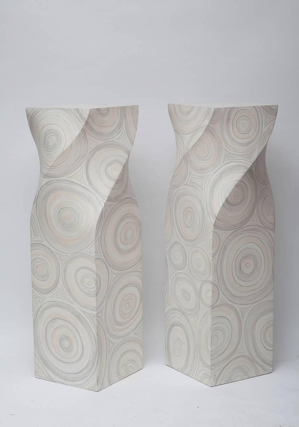 Pair of fiberglass, helix-twisted pedestals, faux painted in a stylized grey and gold agate pattern, circa 1970. Top measures W14in. x D14in.