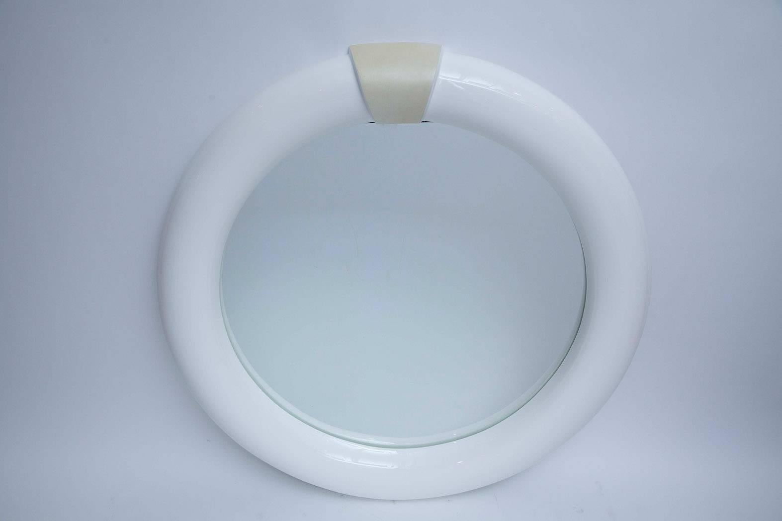 1970s white lacquered mirror with natural goatskin keystone in the manner of Karl Springer.