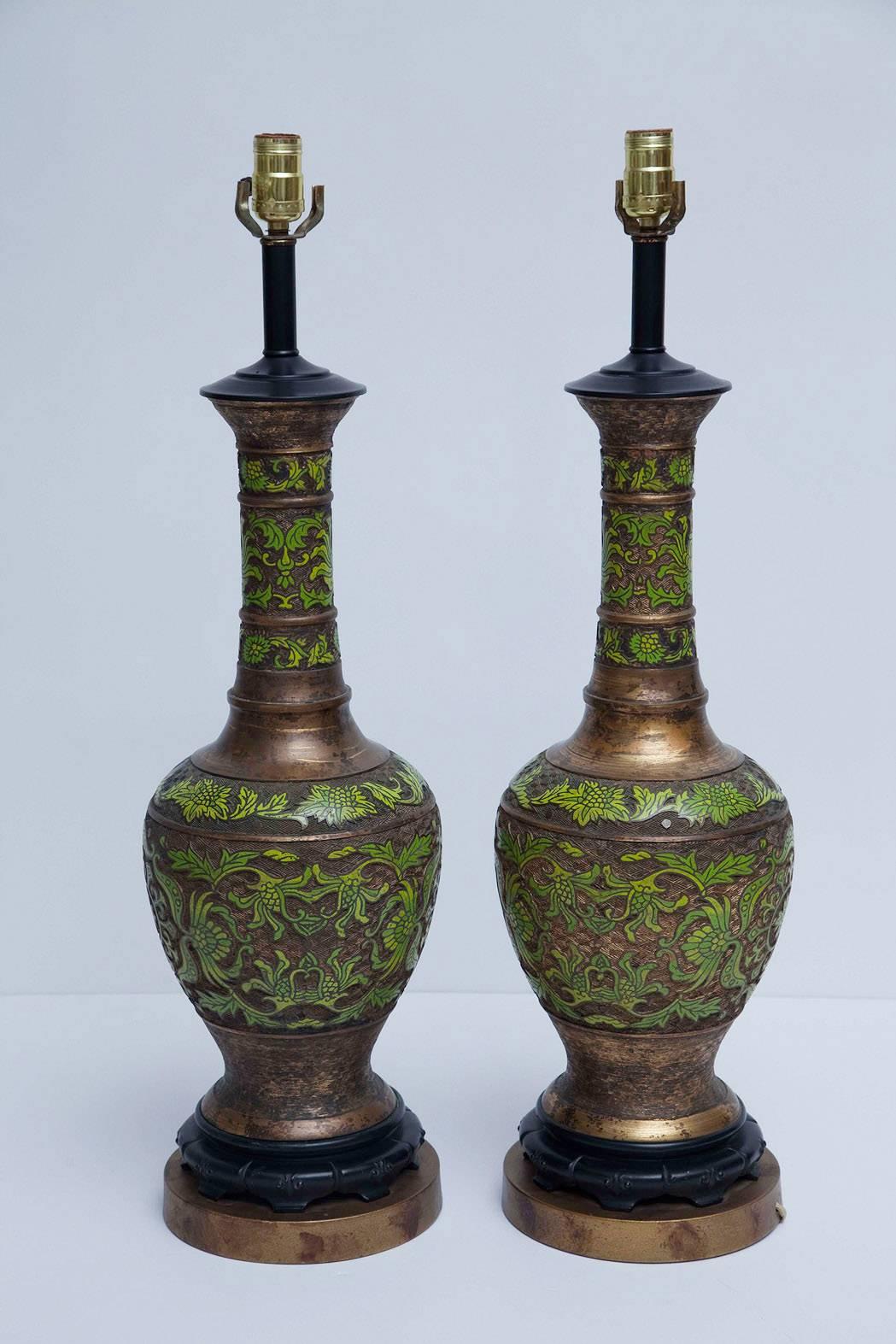 Pair of 1950s Chinese gilt bronze and champlevé enameled lamps, in surprisingly fresh and modern shades of apple and acid green. Newly re-wired. Height measurement below is to top of socket.