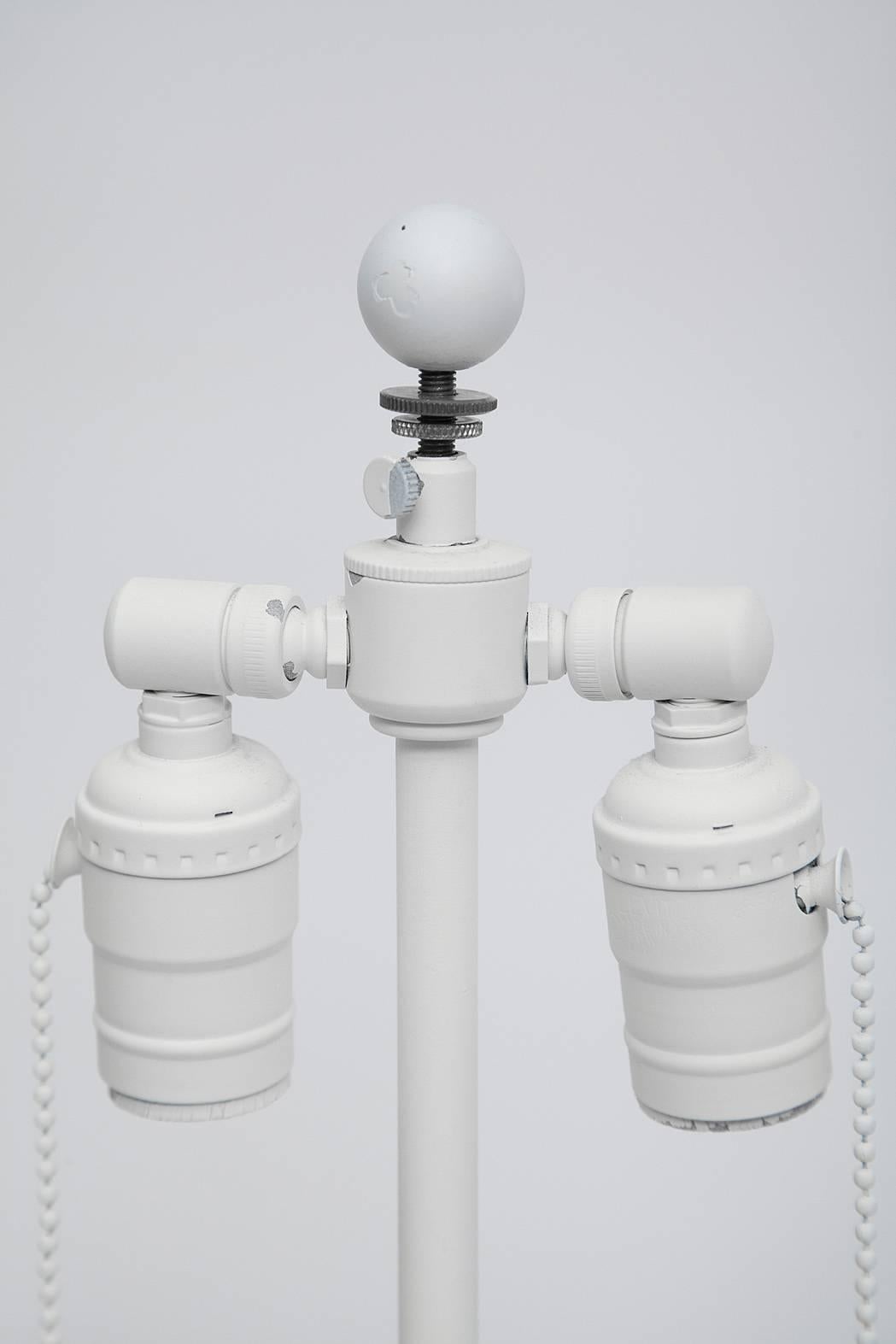 Sirmos white plaster finish lamps. Doric column bases topped by sculptural doves in flight... Enchanting!