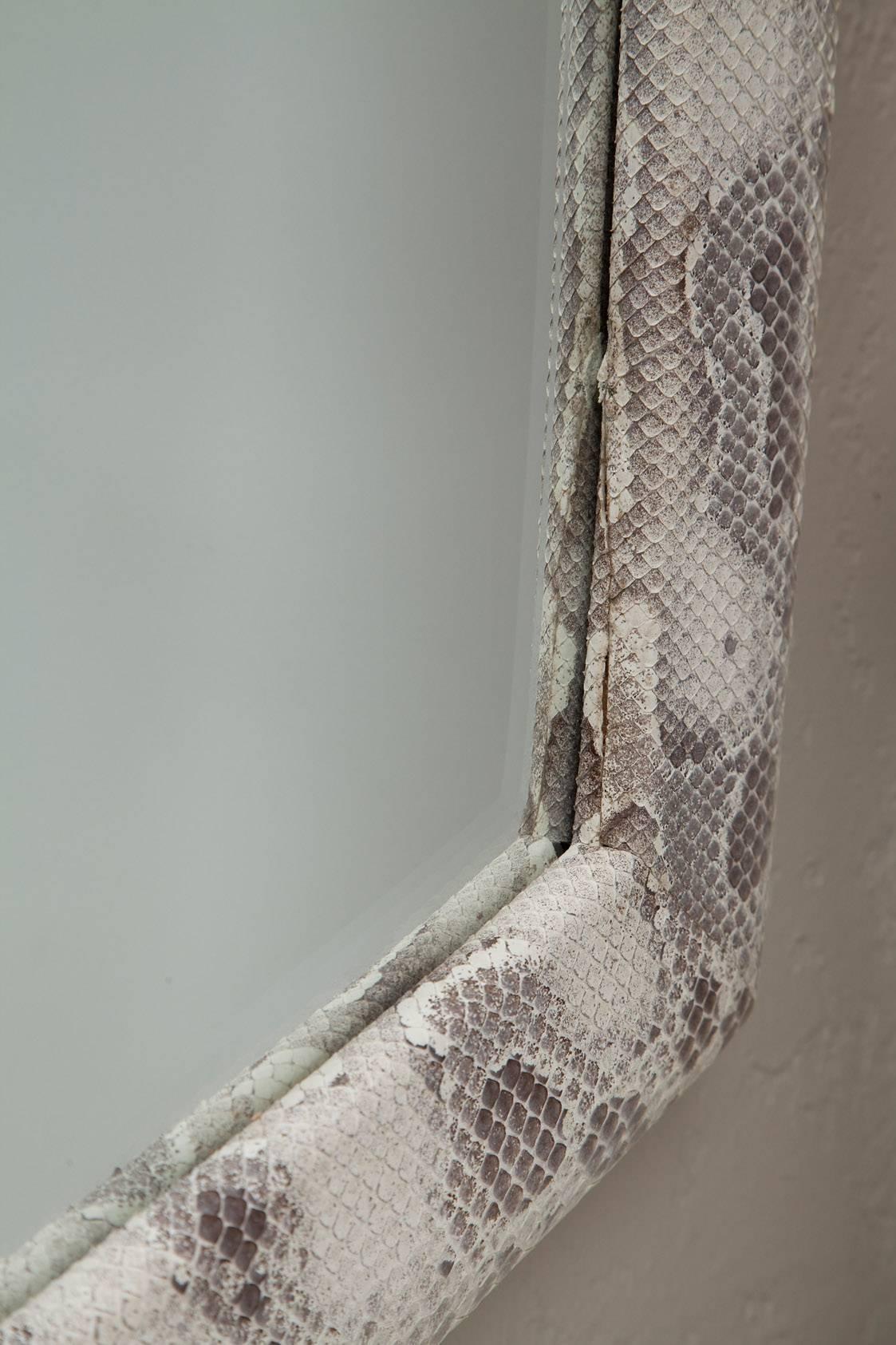 1980s mirror, wrapped in genuine bleached python skin, in the manner of Karl Springer.
