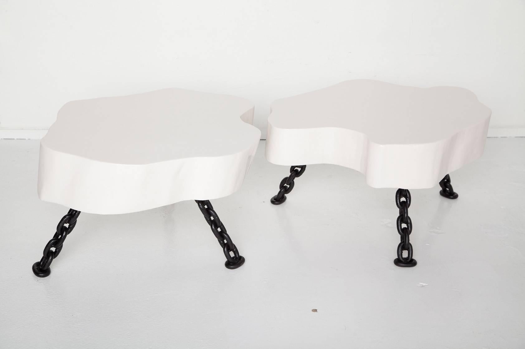 This 1960s free-form tree trunk tables with original chain legs are made even more abstract with a coat of smooth white lacquer. Nautical now! Tables are the same height and length, with slight variance in depth. Measurement below is for largest.