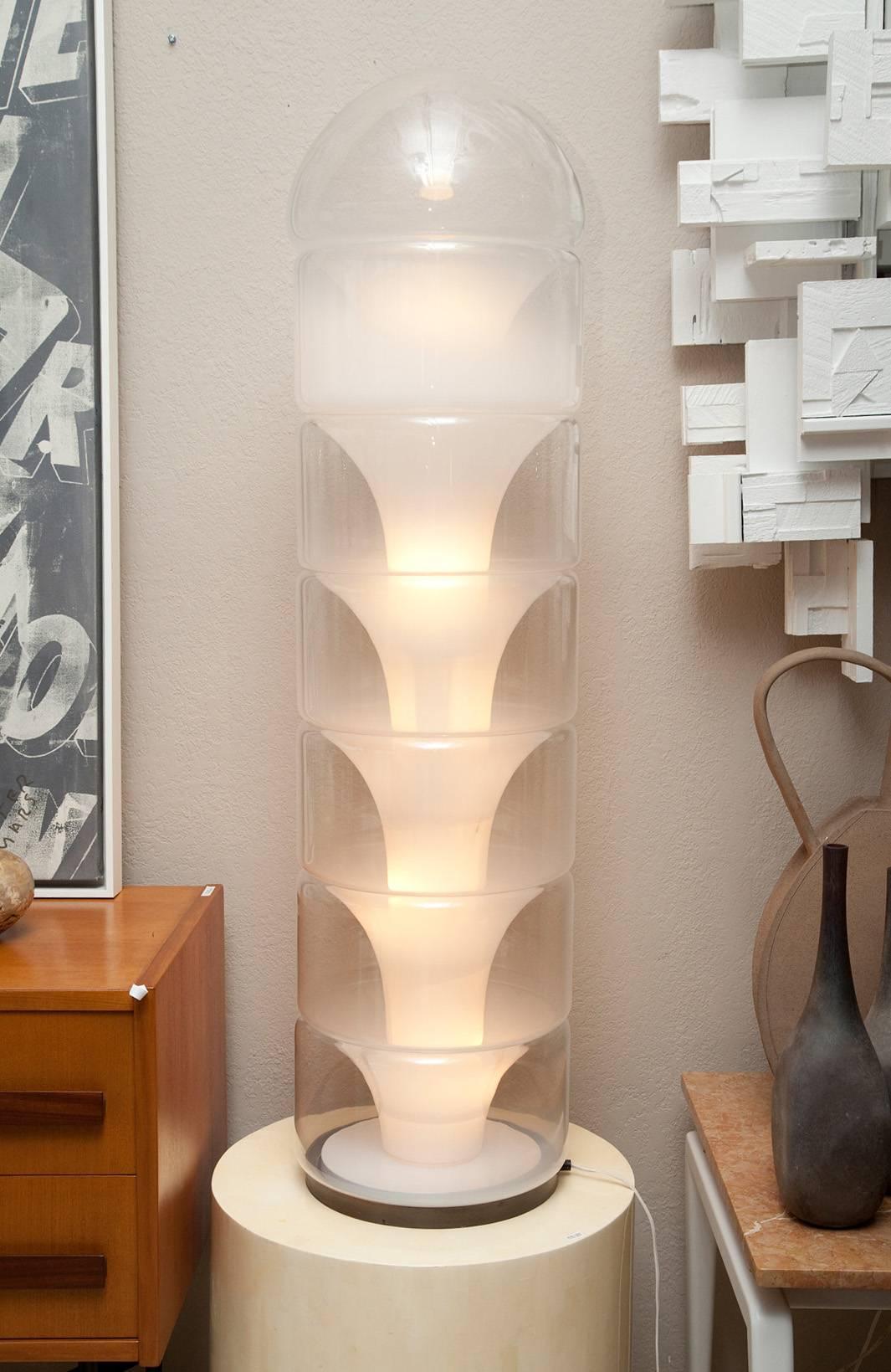 Seven handblown Murano glass elements stack together to create this visually stunning floor lamp designed by Carlo Nason for Mazzegga. Central pillar with six interior lights. Original U.S. wiring.