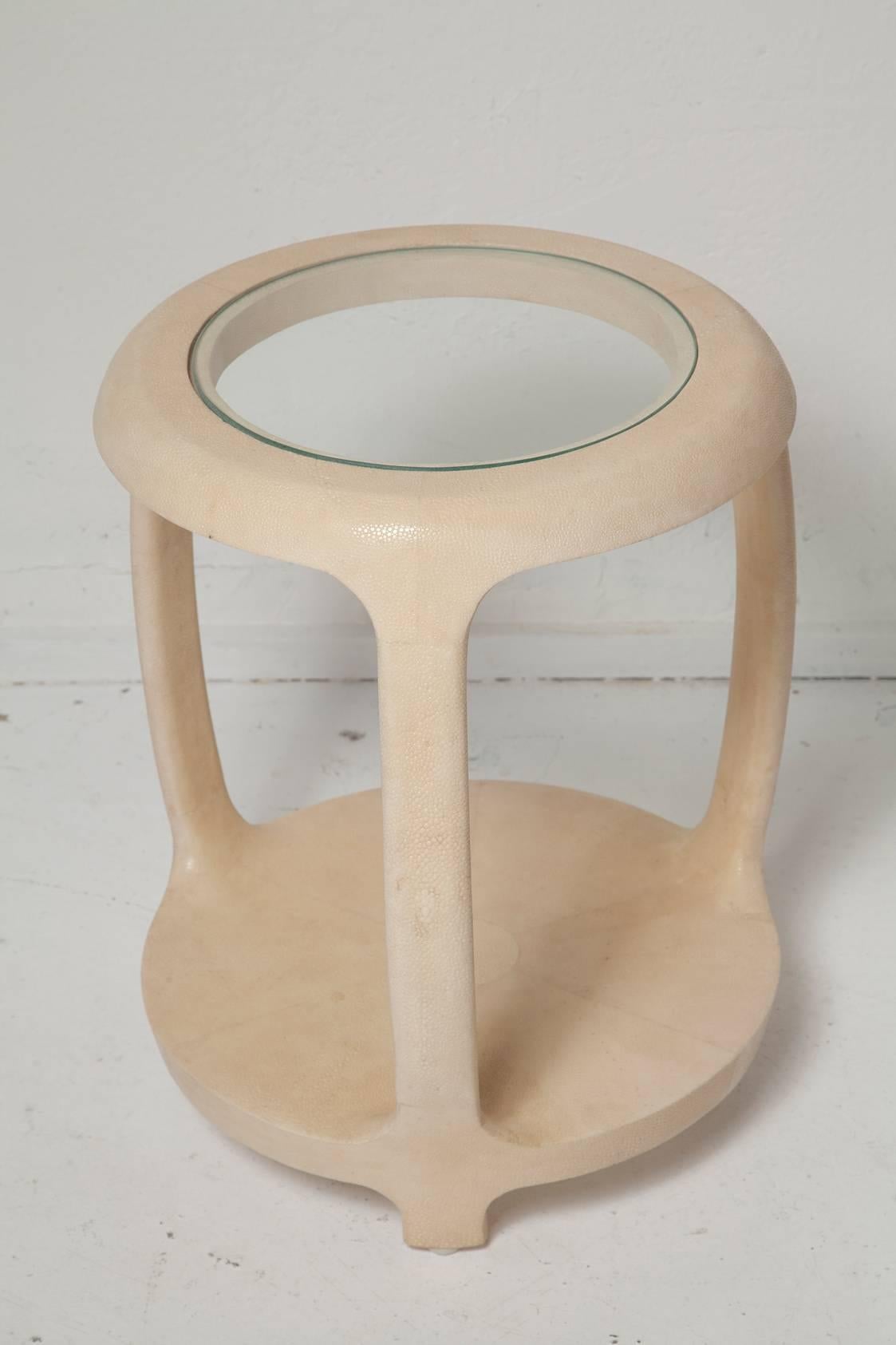 Subtle vanilla shagreen side table with glass top by Maitland Smith. Brass label on underside.
