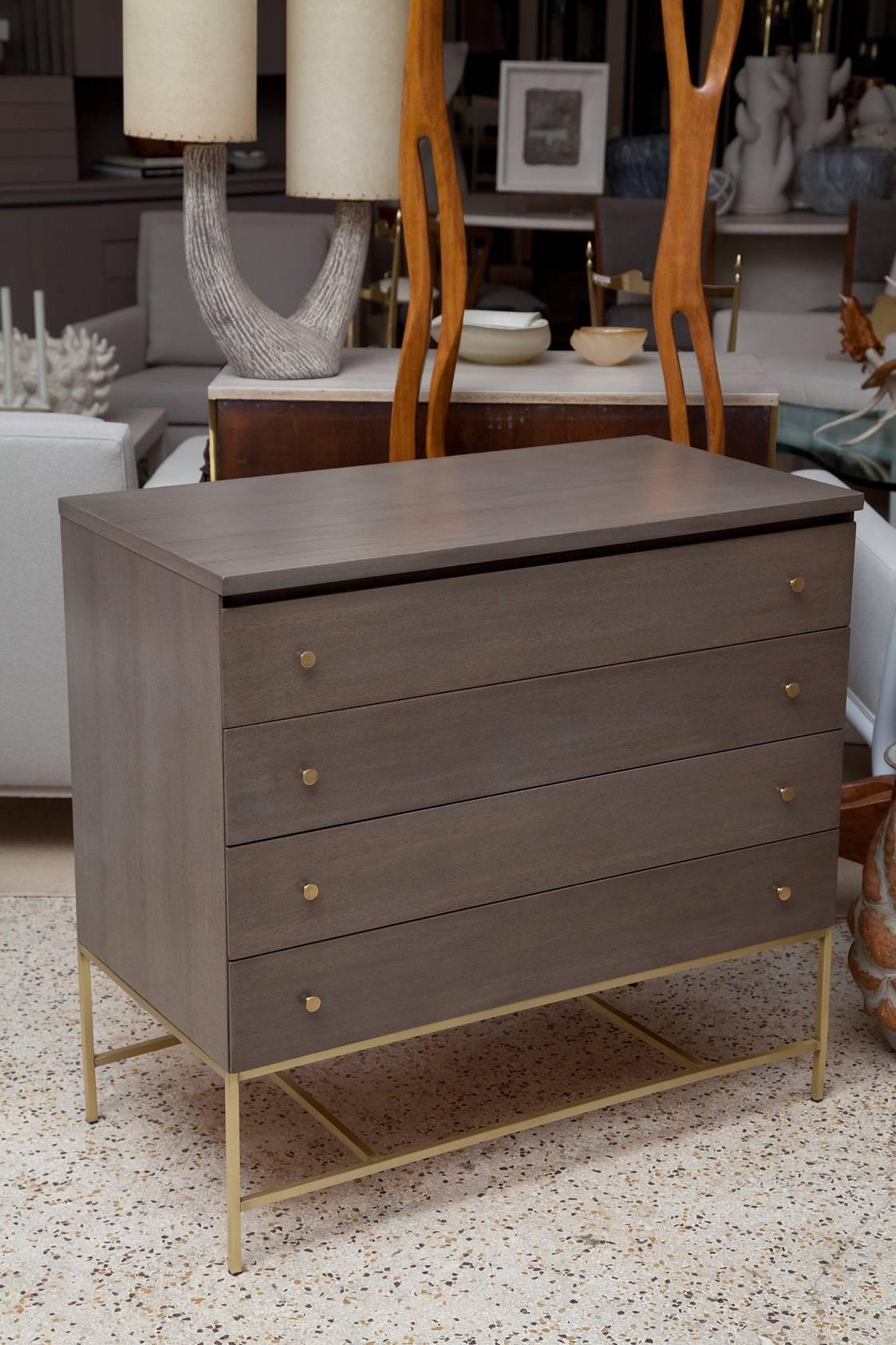 I love olive, and you will too when you see this gorgeous custom grey-green mahogany bachelor chest with solid brass hardware, part of the Irwin collection, designed by Paul McCobb for Calvin. Immaculately restored.