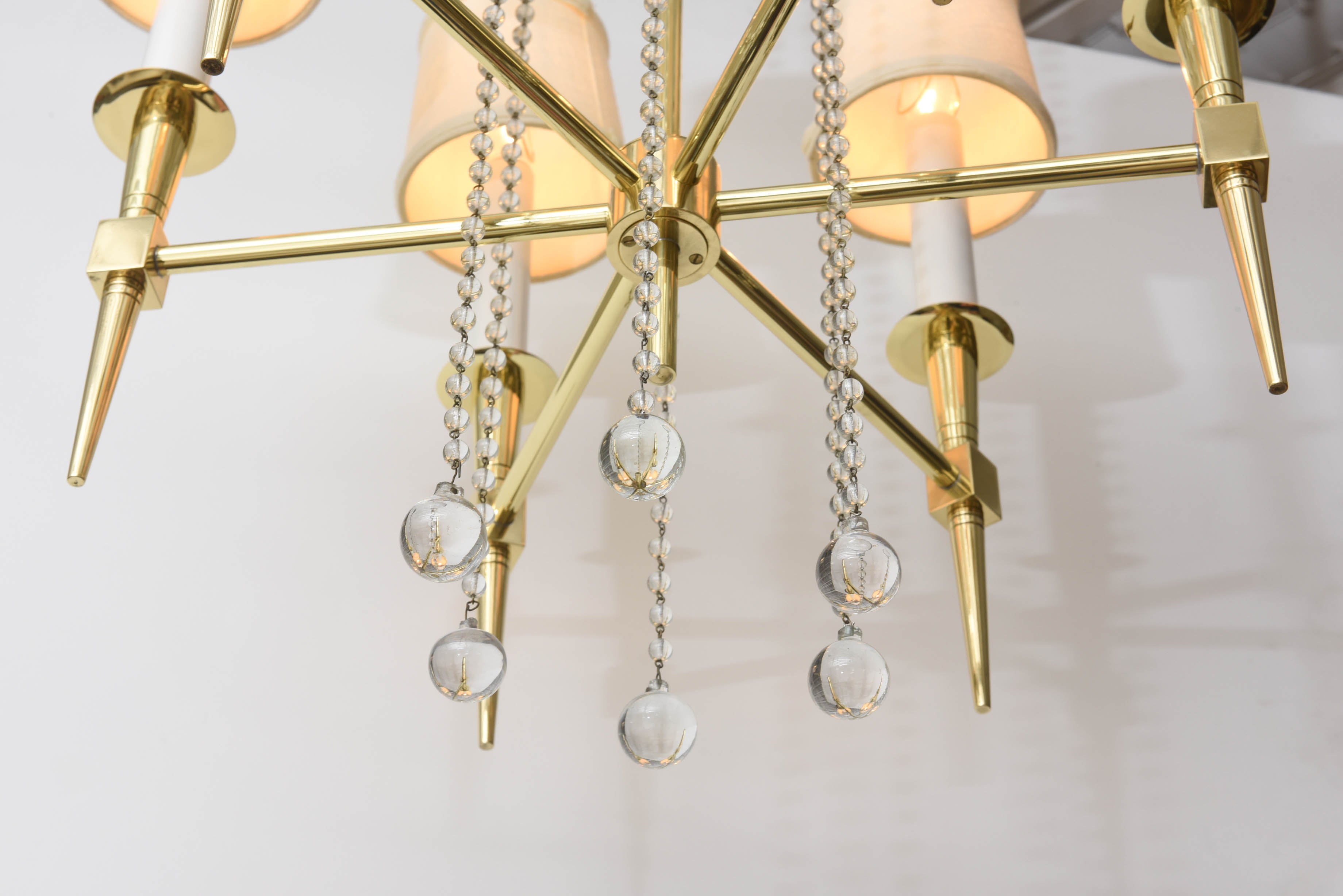 American Polished Brass and Glass Beaded Chandelier by Tommi Parzinger For Sale