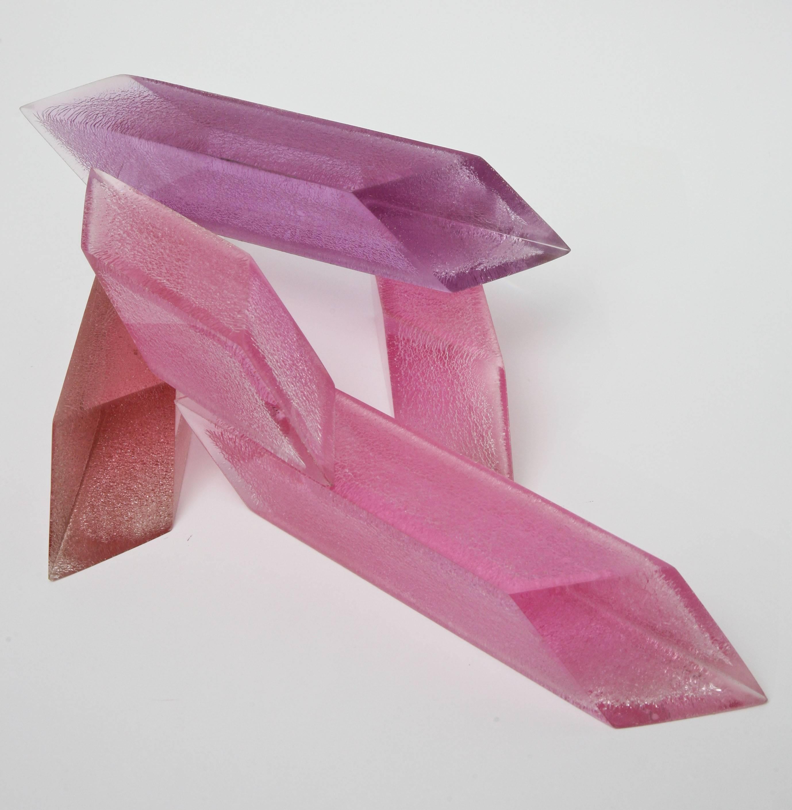 These set of five colored Lucite and crackled sculptures can go into any configuration. They are like angled and thick pick up sticks.
They have been attributed to Norman Mercer.
The colors are three pink, one purple and one peach. They have an