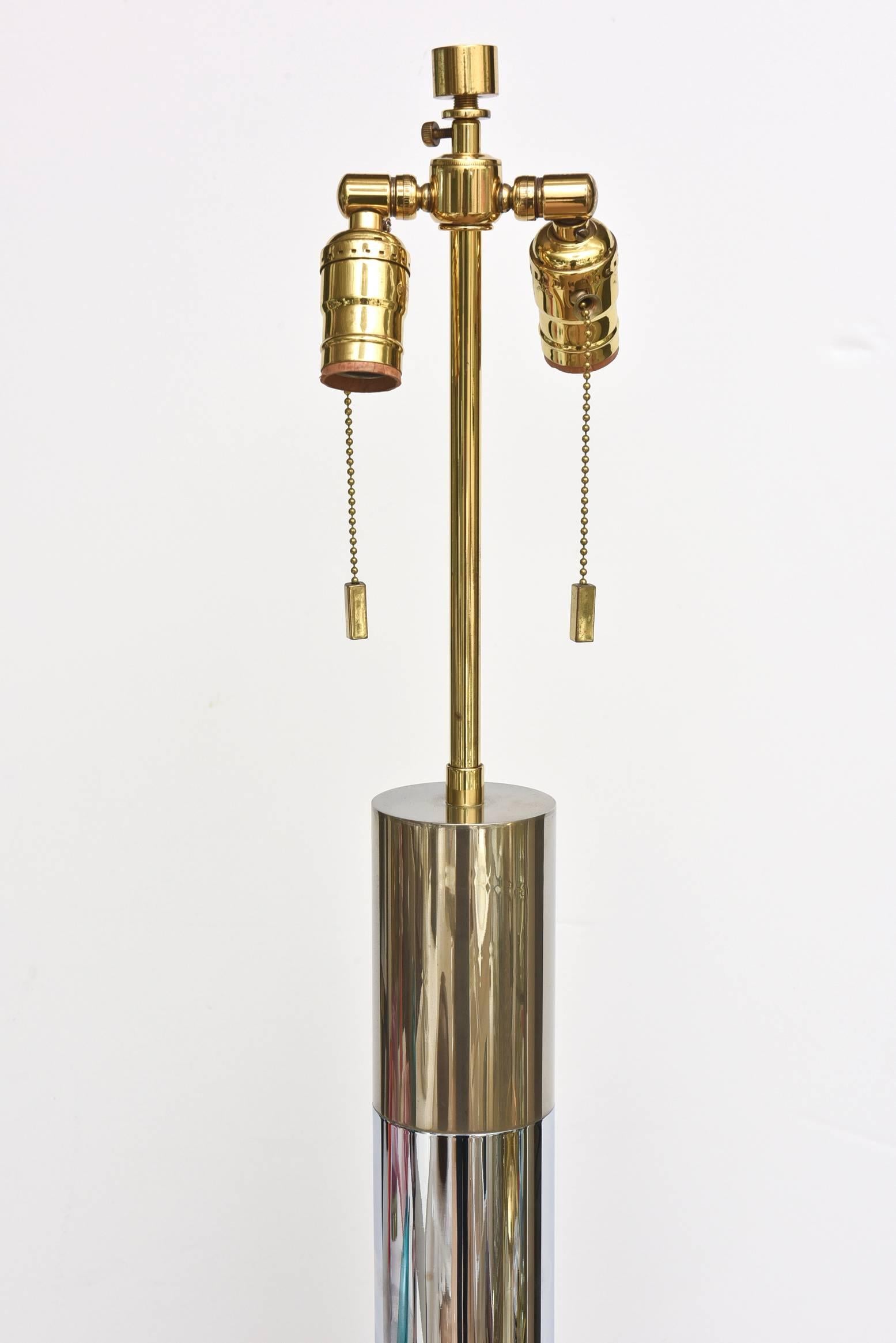 This mint condition Karl Springer floor lamp has the two sockets with pull chains. It has alternating chrome and brass with a 12