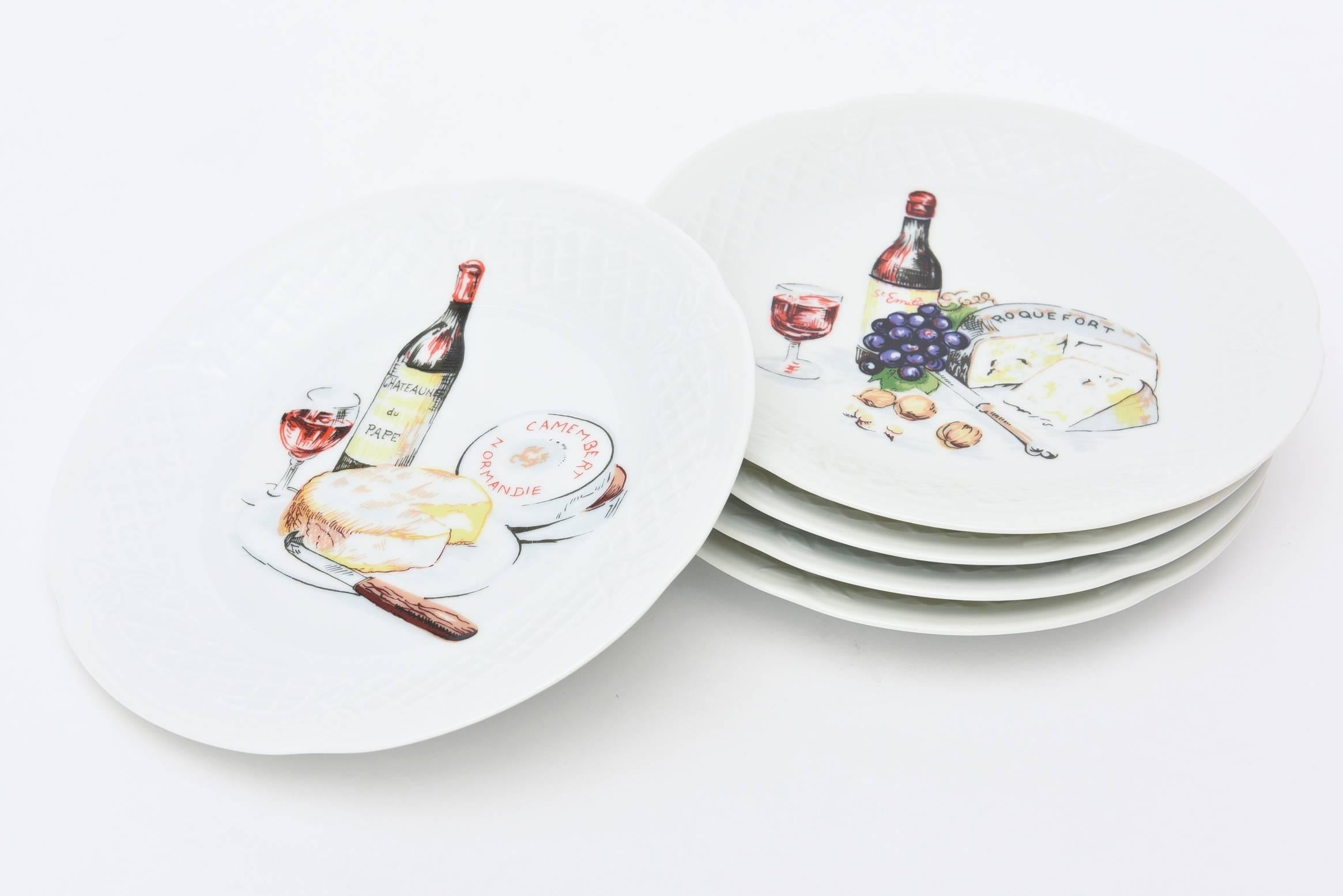 These artful and beautiful fine porcelain desert/cheese plates have beautiful
colors. They are all different depictions of lobster, wine, grapes, cheese, meats and would make a beautiful hostess gift or add to your table setting or barware.
They
