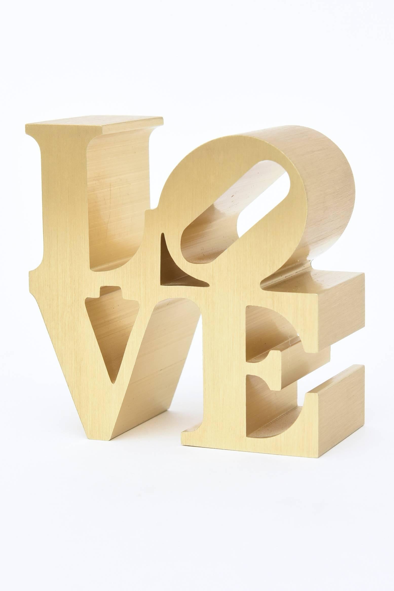 Robert Indiana became famous for his large love sculpture. This miniature sculpture paperweight was done in the 1970s and sold in museum stores then such as MoMA.
It is a small sculpture or a paperweight for a desk accessory!
It is brushed