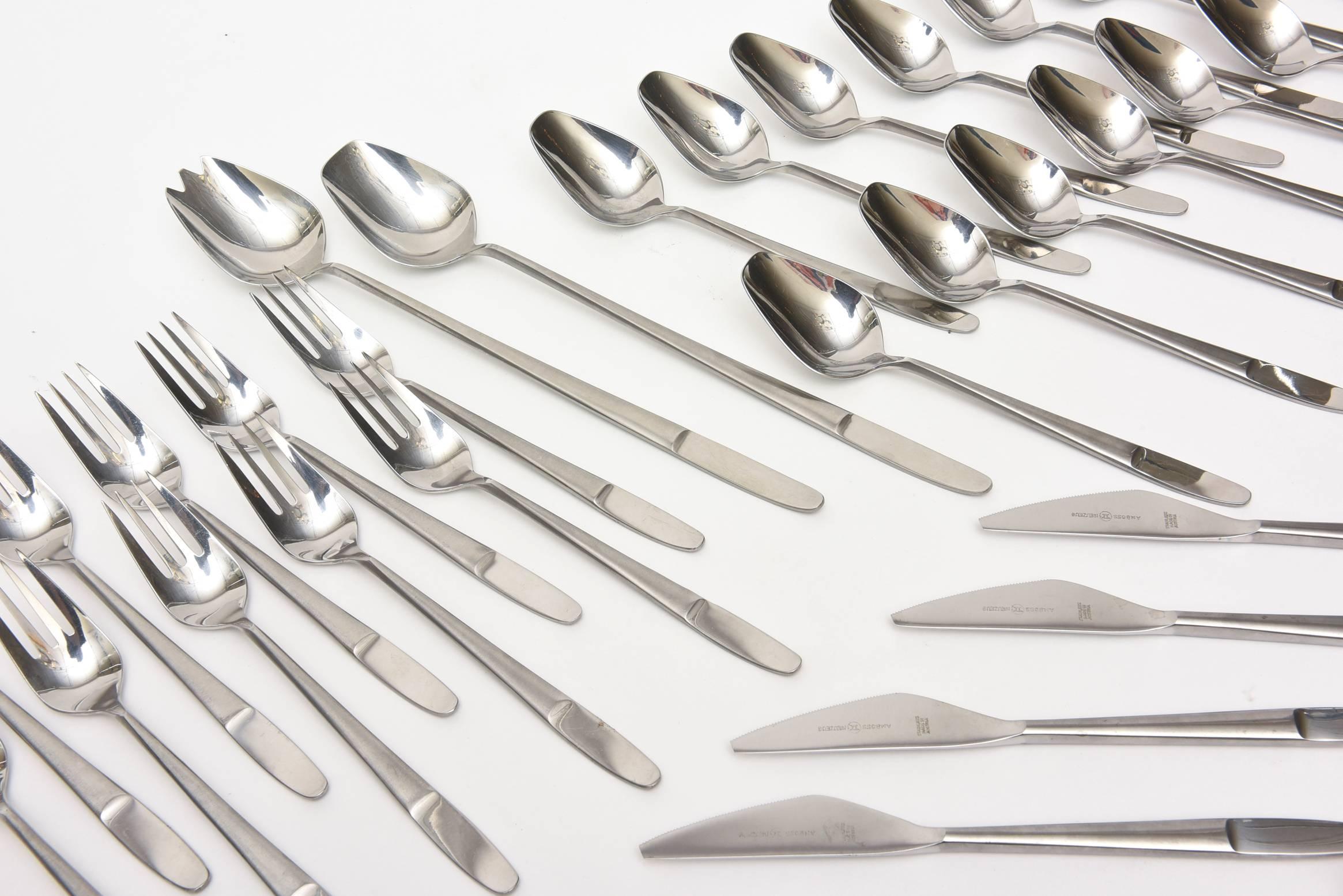 This wonderful set of high quality flatware made of stainless steel was designed by Helmut Adler for the manufacturer of Amboss Austria. It is called the Concept Pattern #2070. It remains today timeless and modern. It was done in the 1960s. Amboss